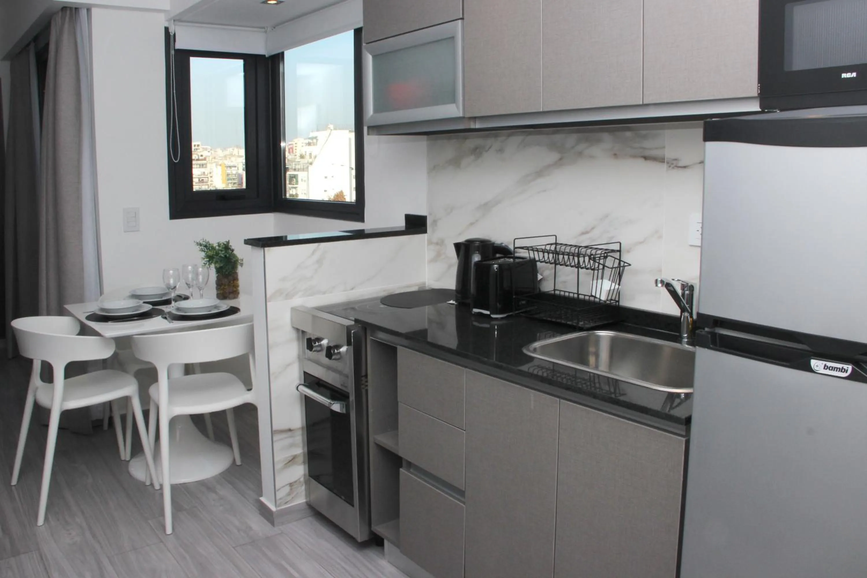 Kitchen or kitchenette in In House BA - Le coq