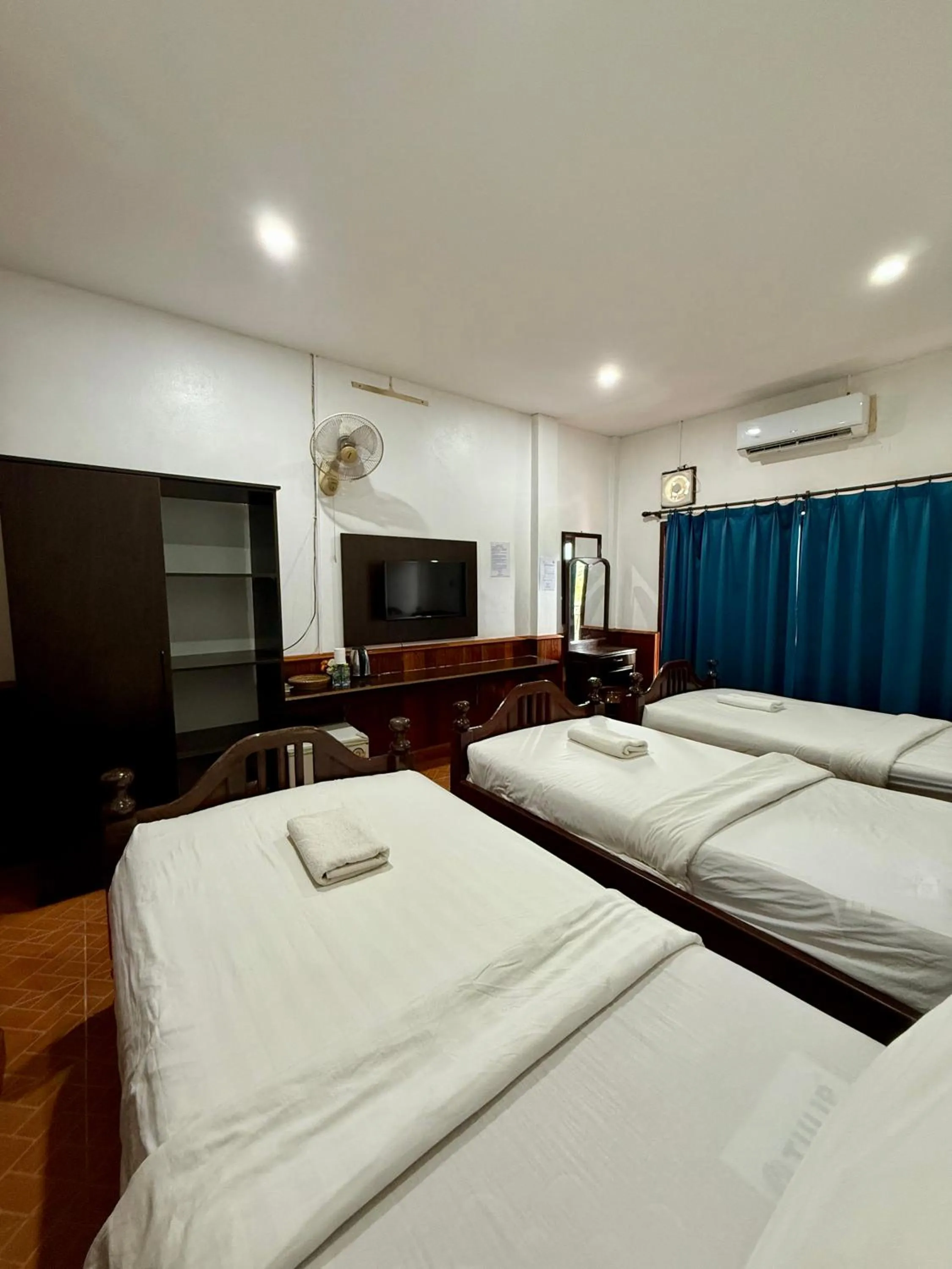 Bed in Domon Riverside Hotel