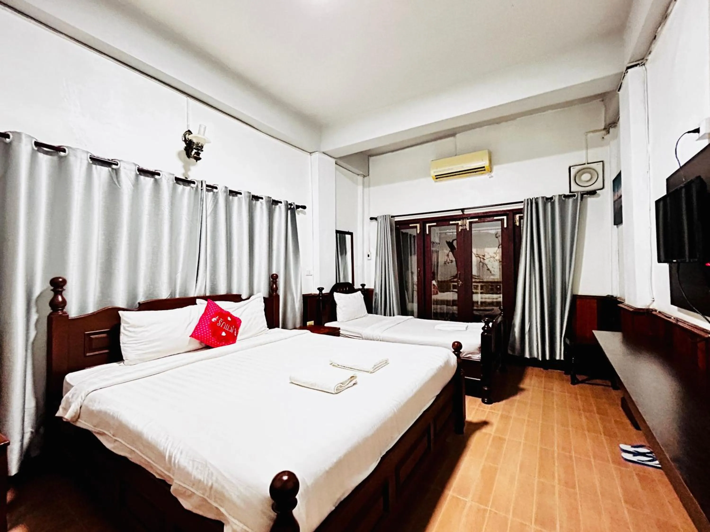 Bed in Domon Riverside Hotel