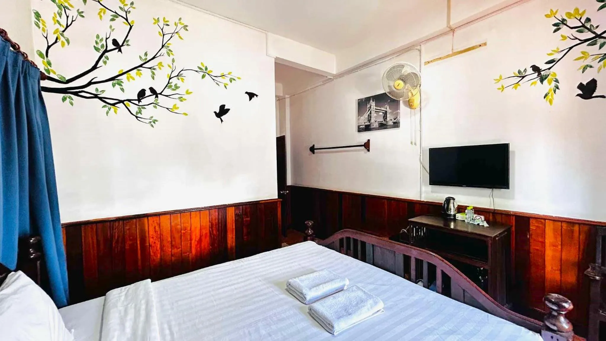 Bed in Domon Riverside Hotel