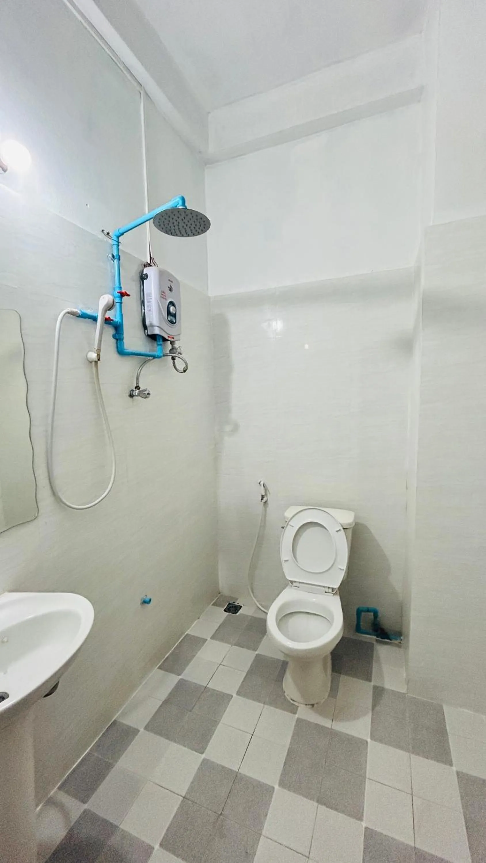 Shower in Domon Riverside Hotel