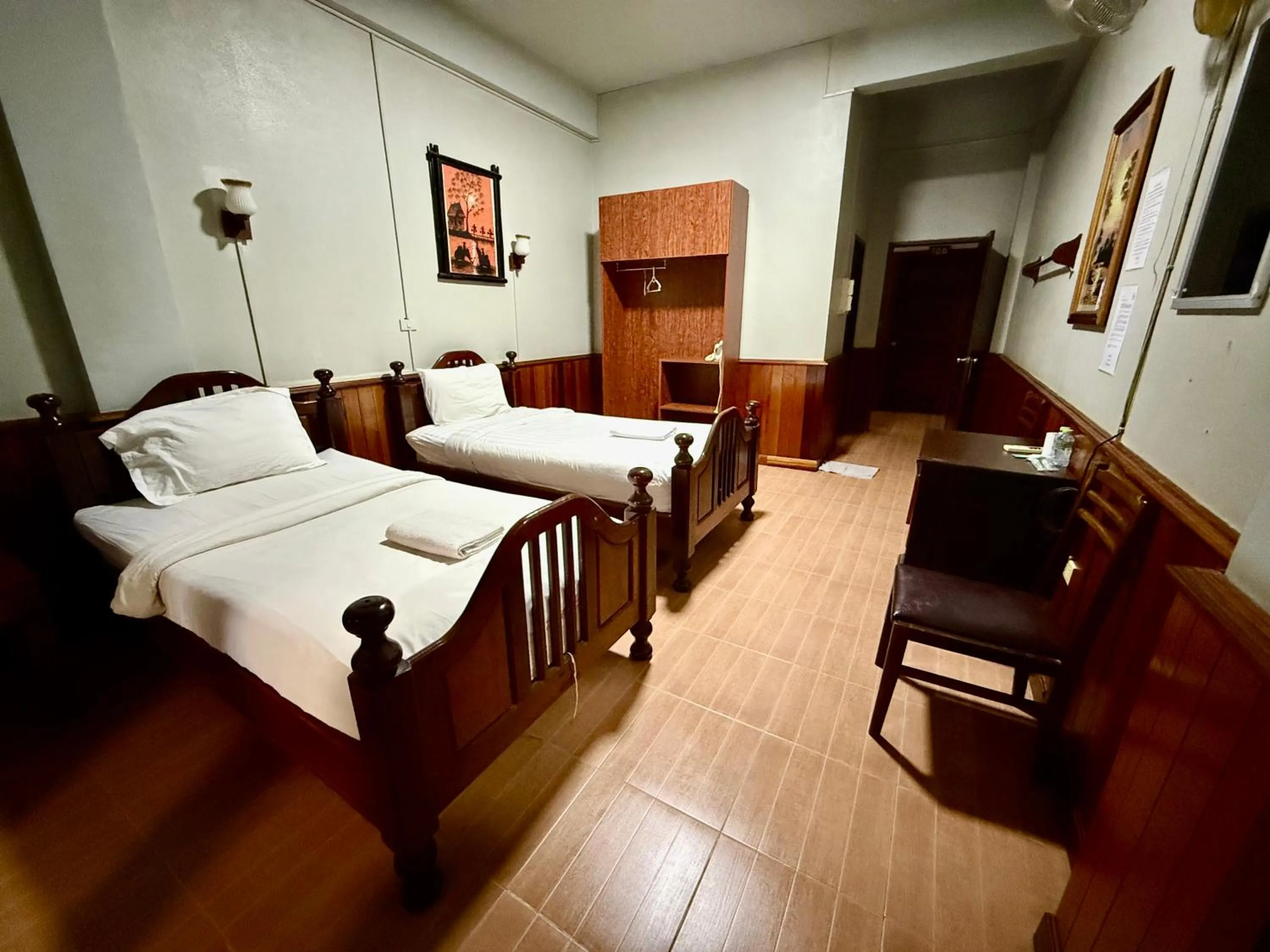 Bed in Domon Riverside Hotel