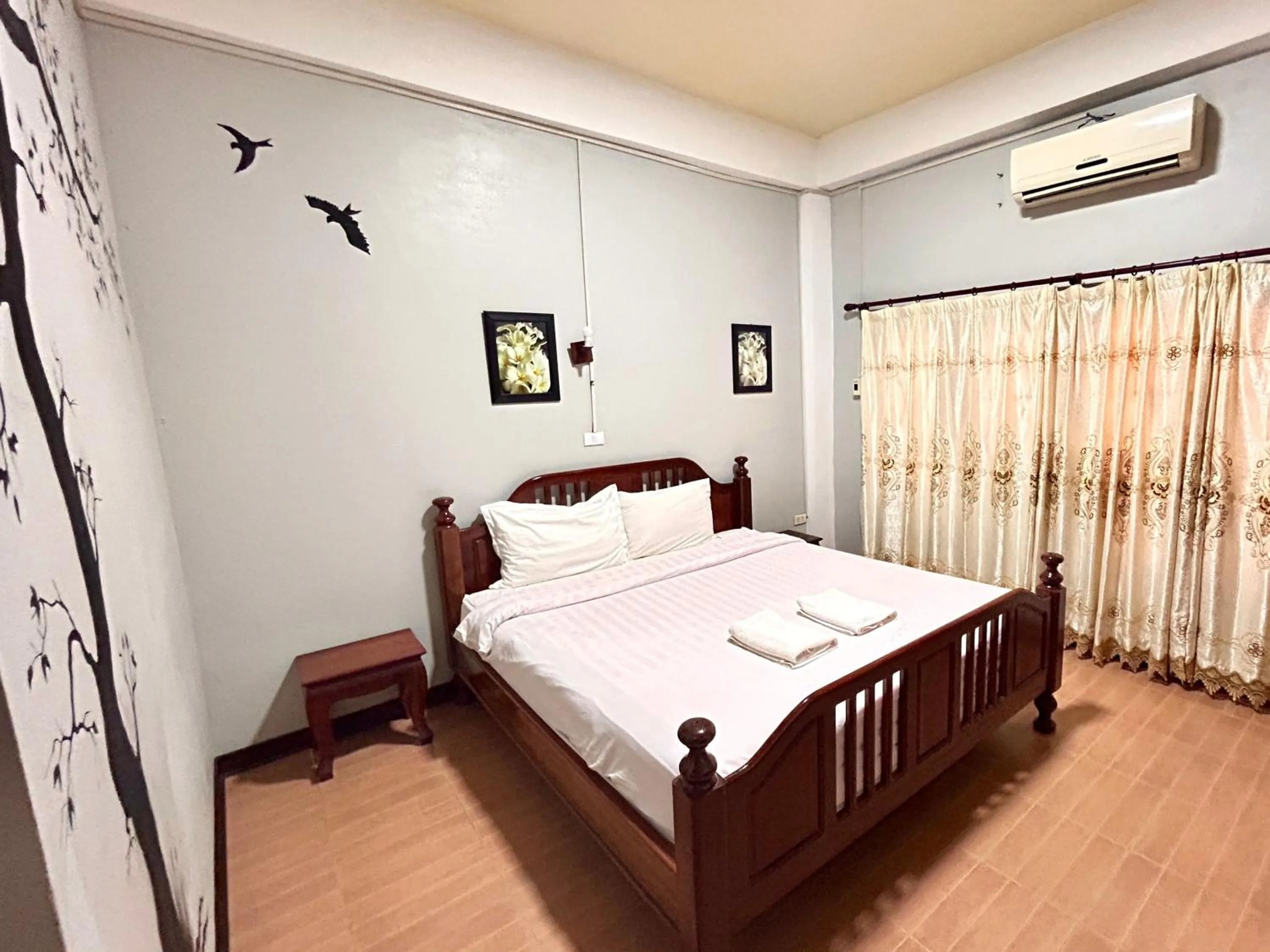 Bed in Domon Riverside Hotel