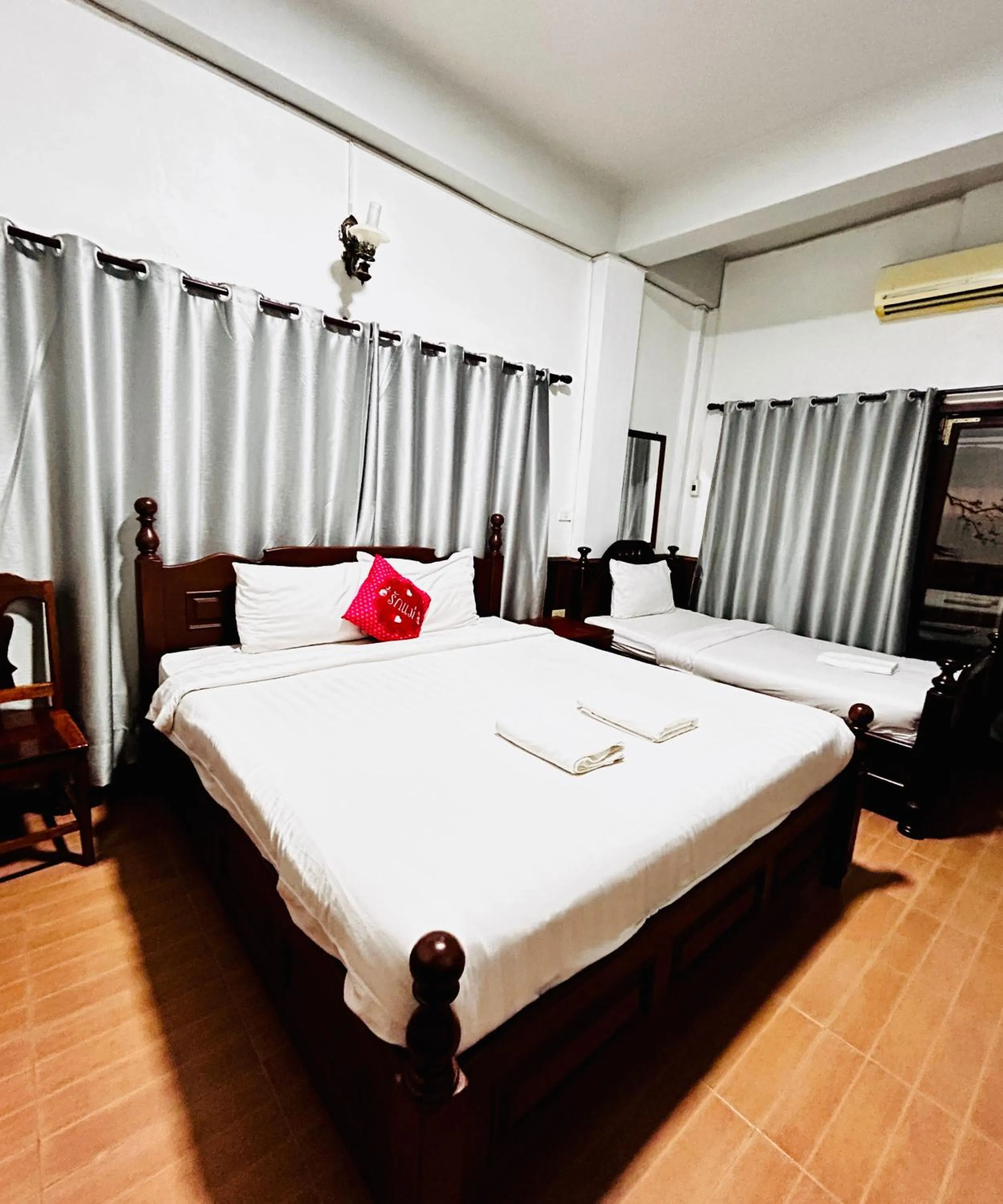 Bed in Domon Riverside Hotel