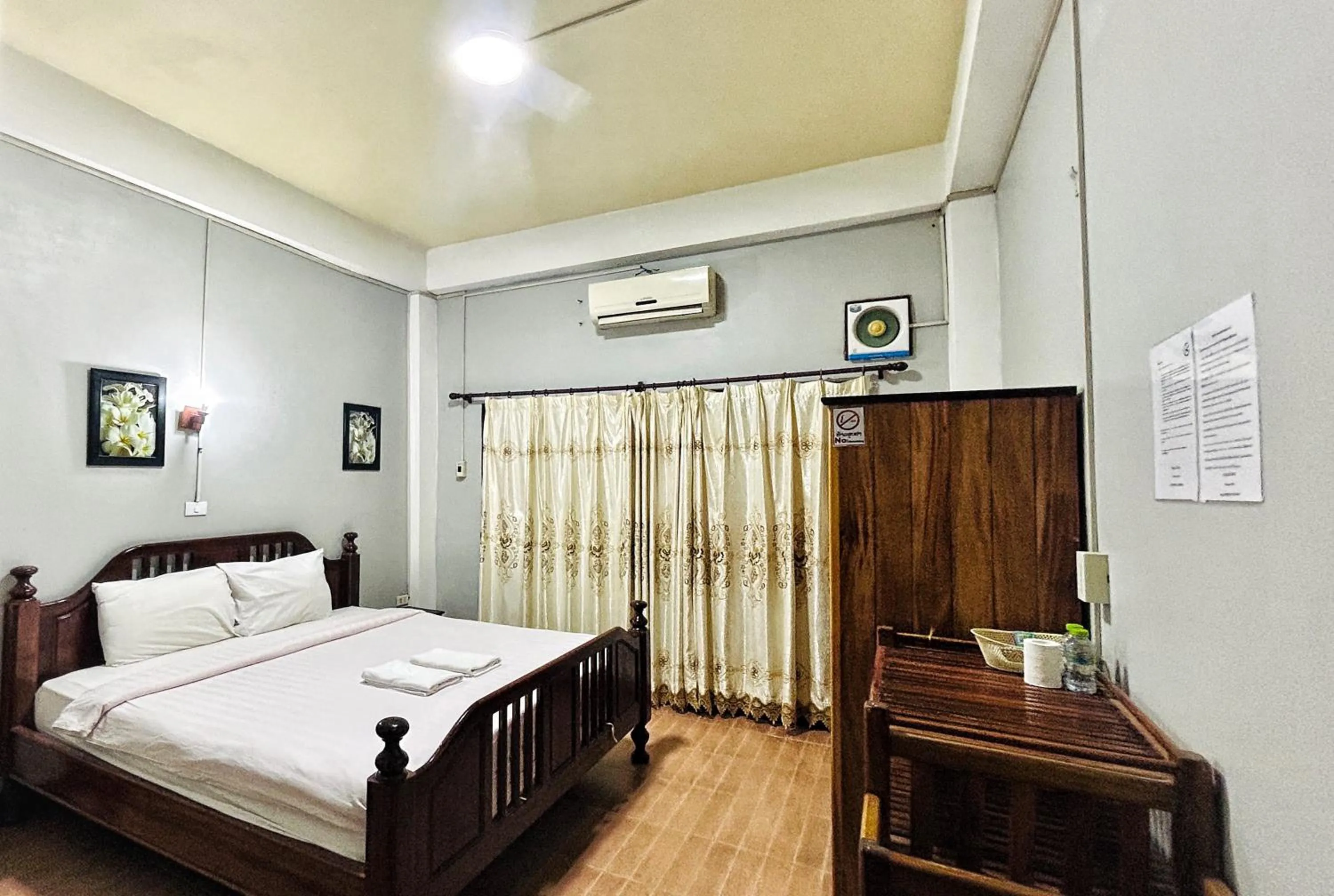 Bed in Domon Riverside Hotel