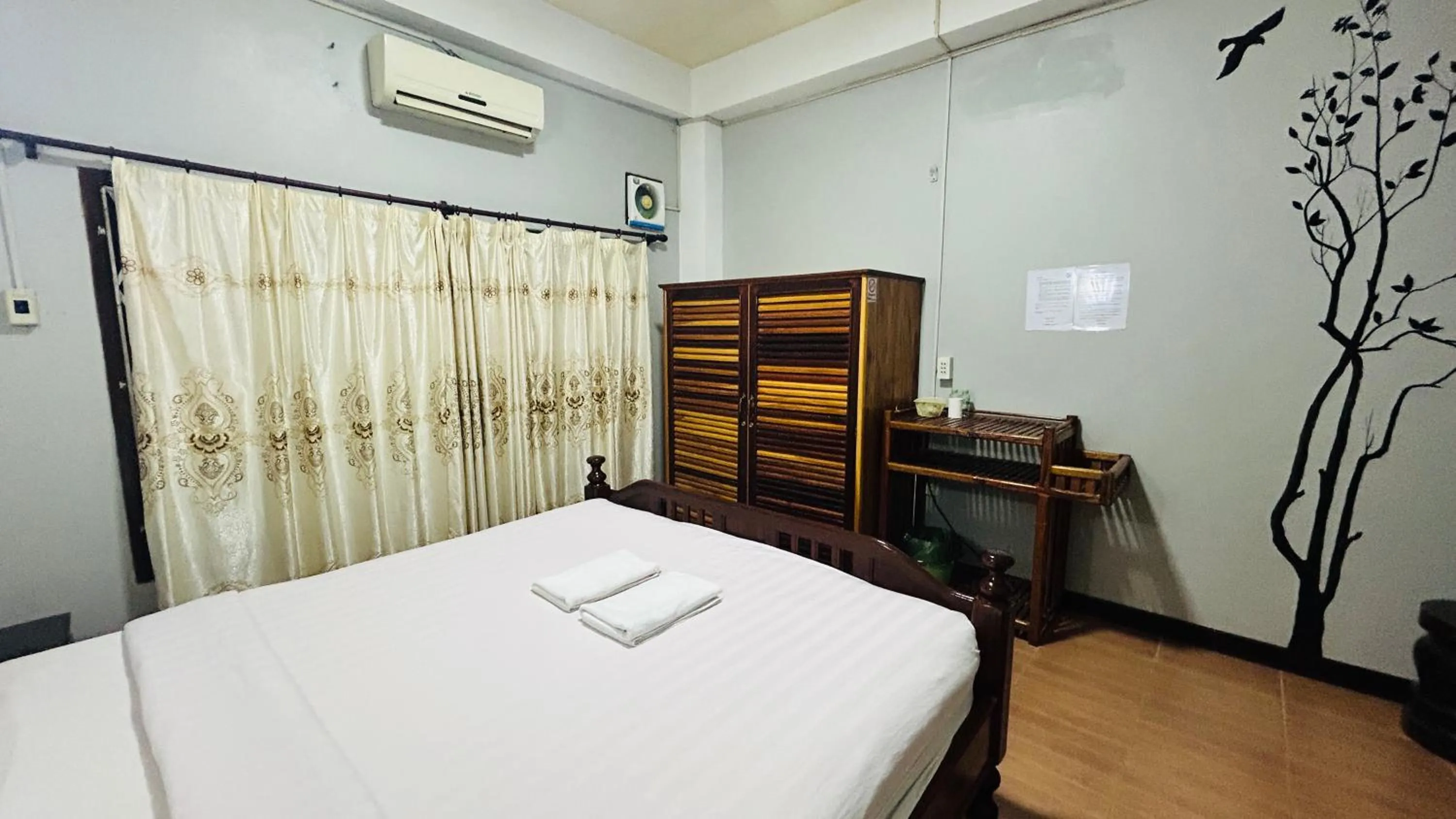 Bed in Domon Riverside Hotel