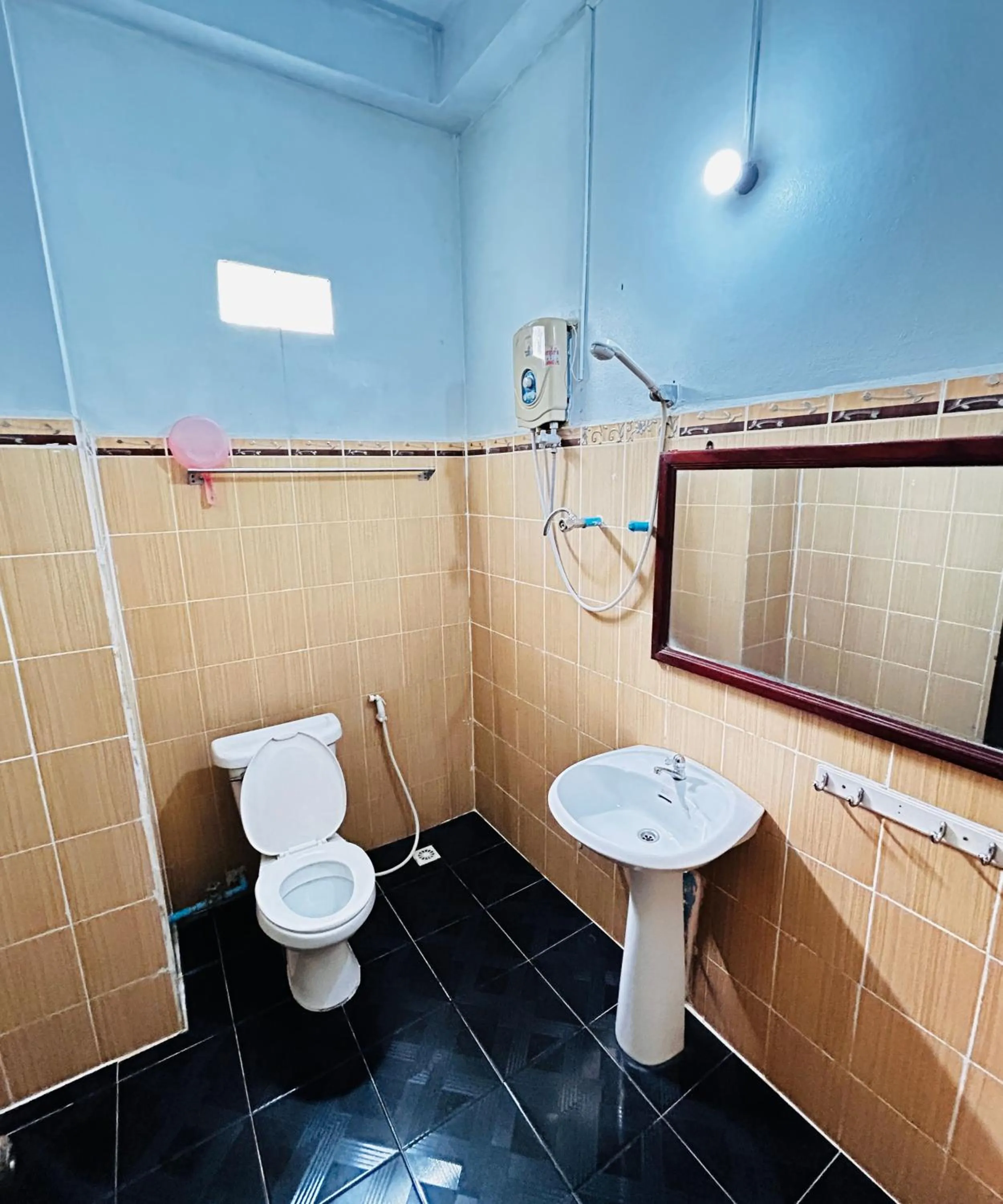 Shower in Domon Riverside Hotel