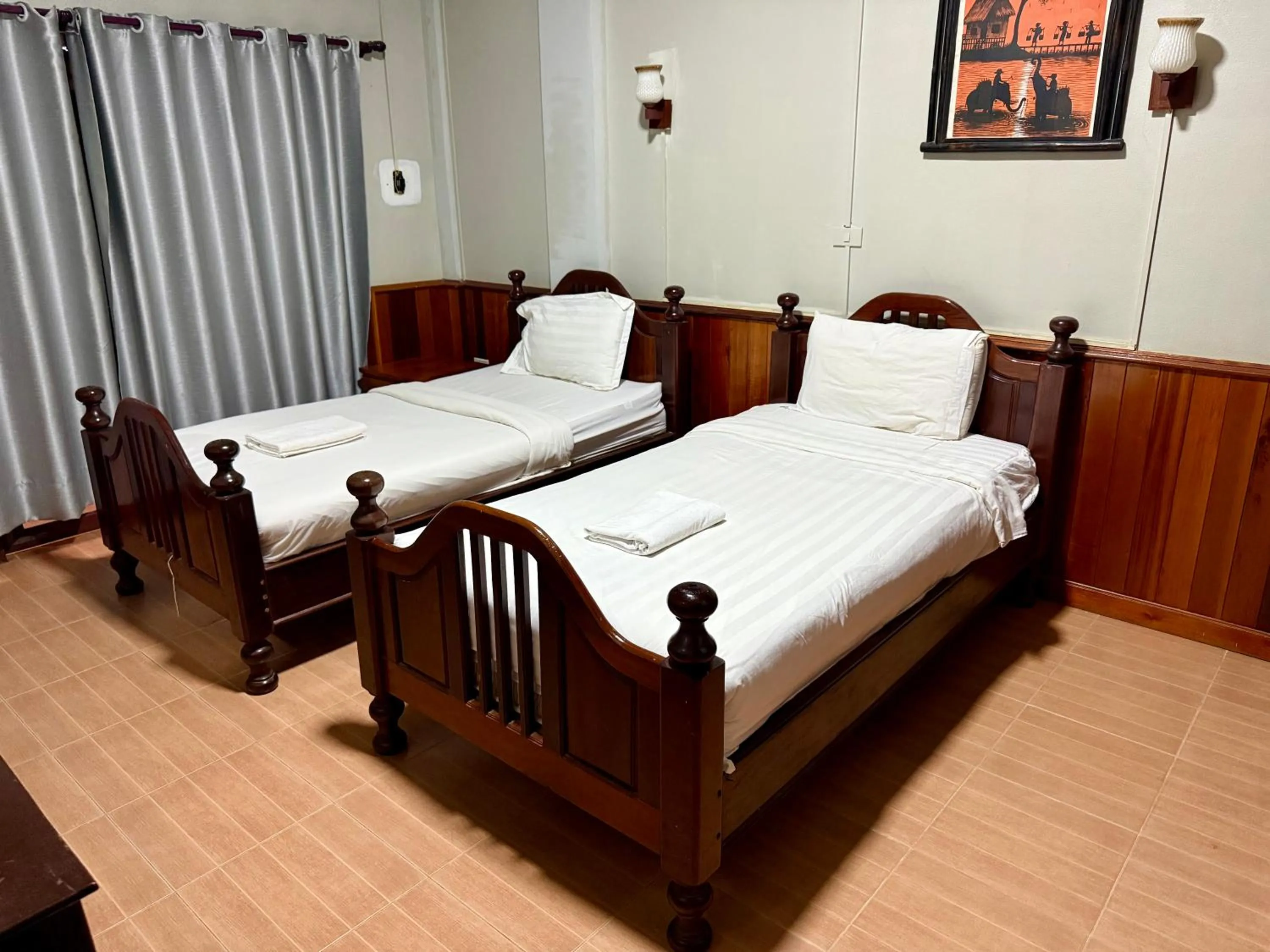 Bed in Domon Riverside Hotel