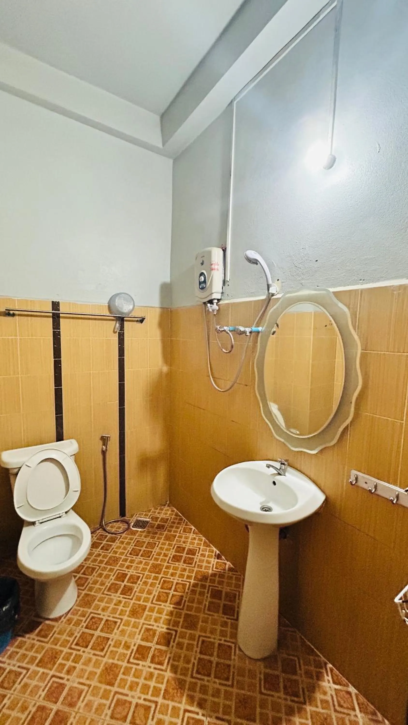 Shower in Domon Riverside Hotel