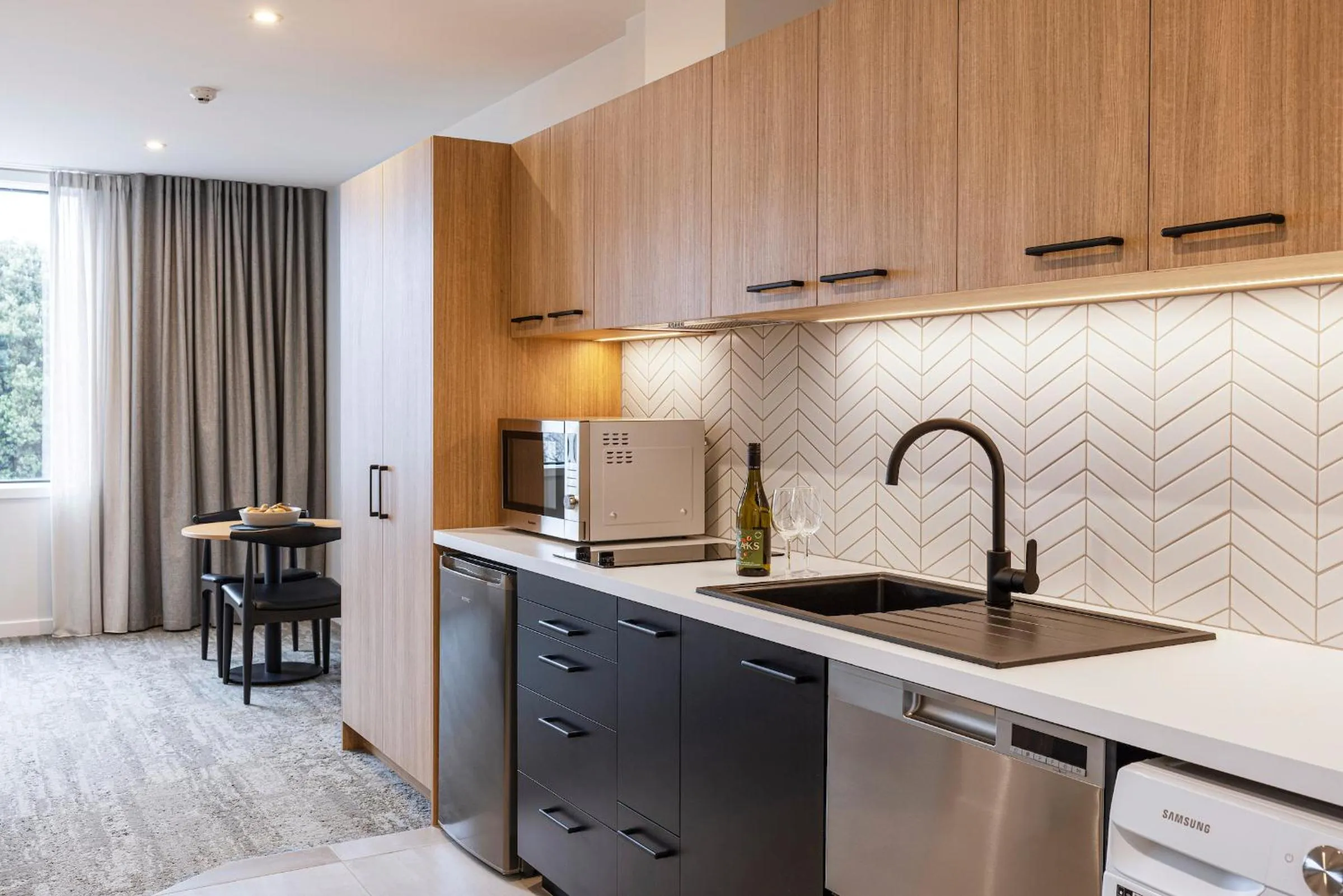 Kitchen or kitchenette in Quest Mt Maunganui