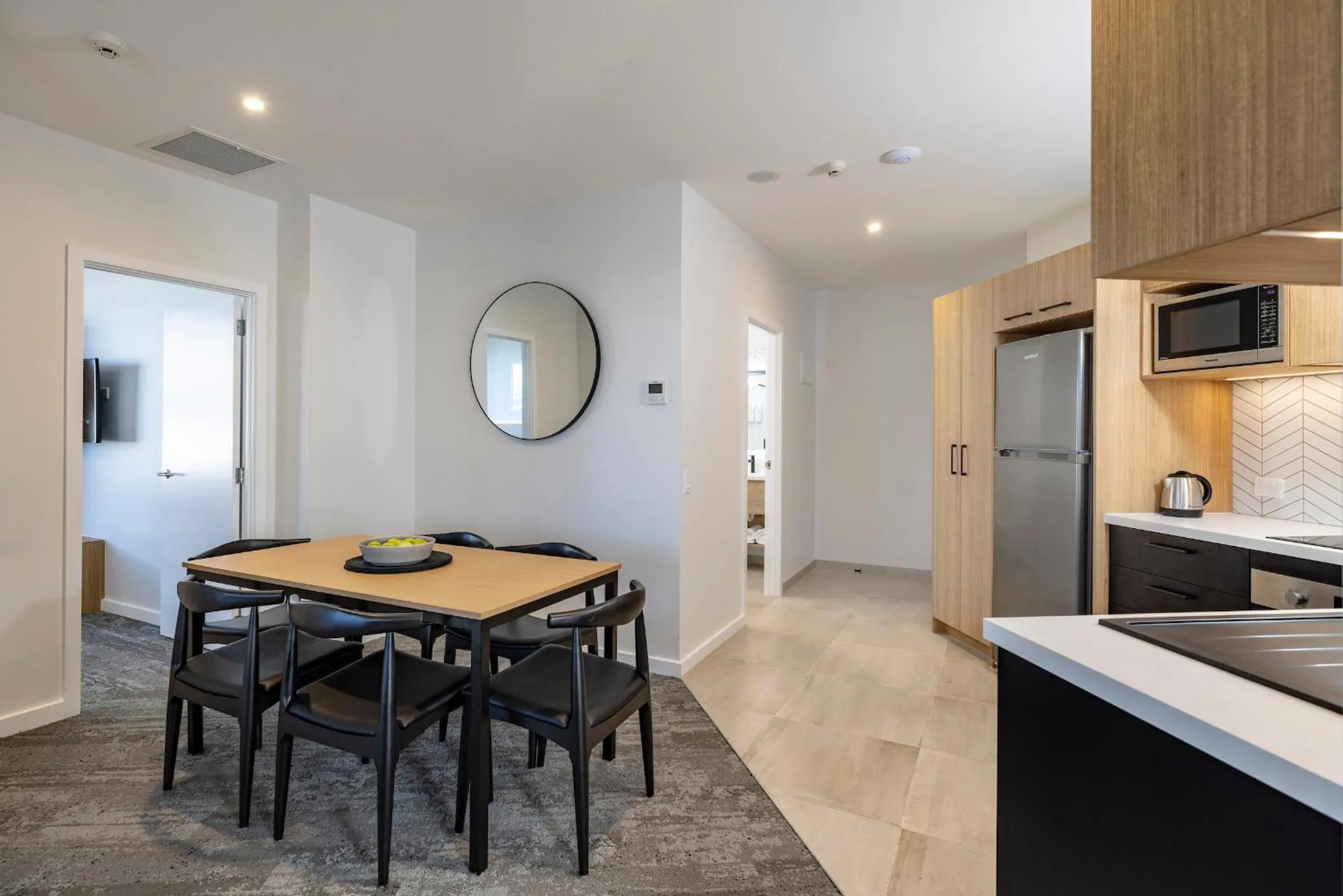 Kitchen or kitchenette in Quest Mt Maunganui