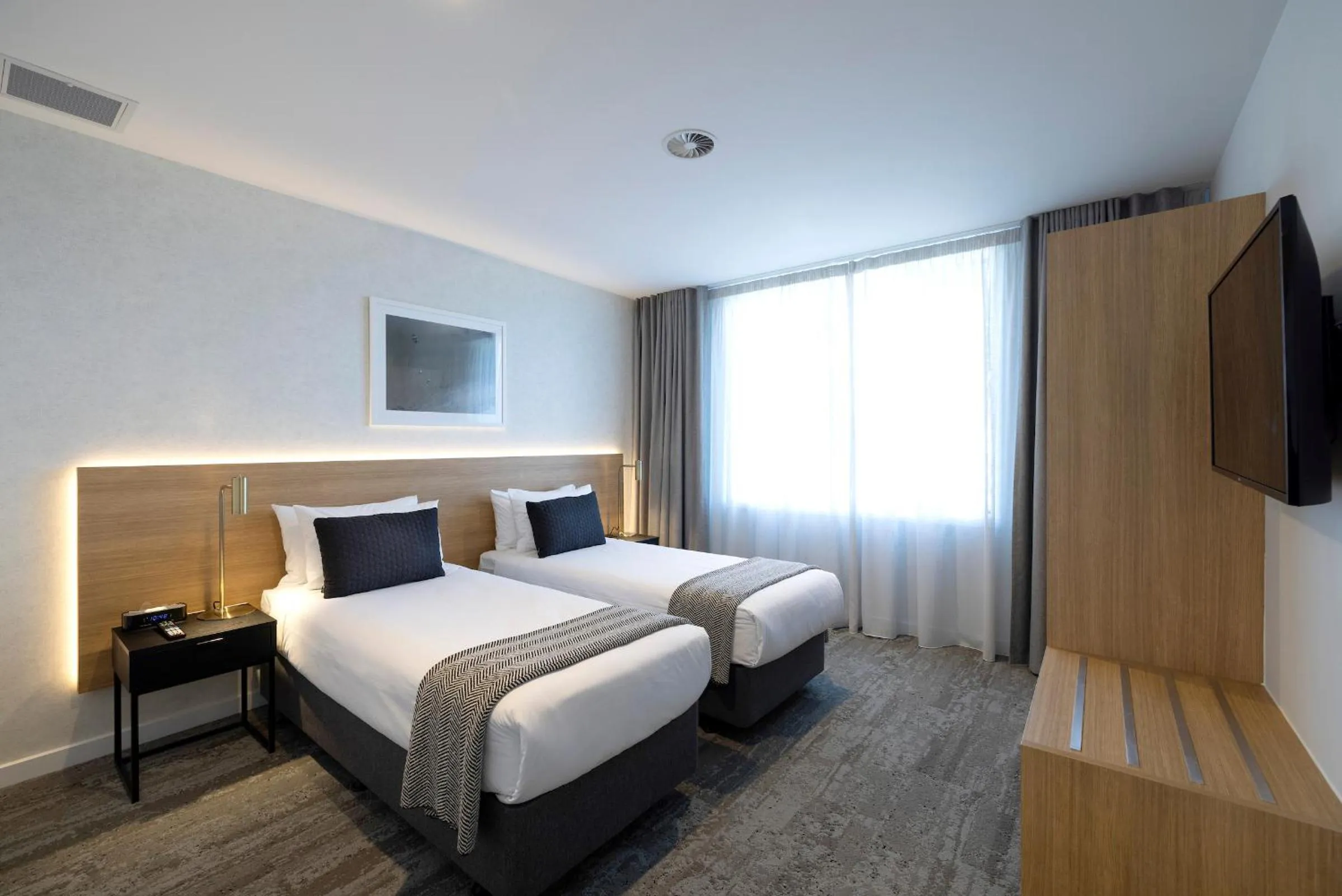 Bed in Quest Mt Maunganui