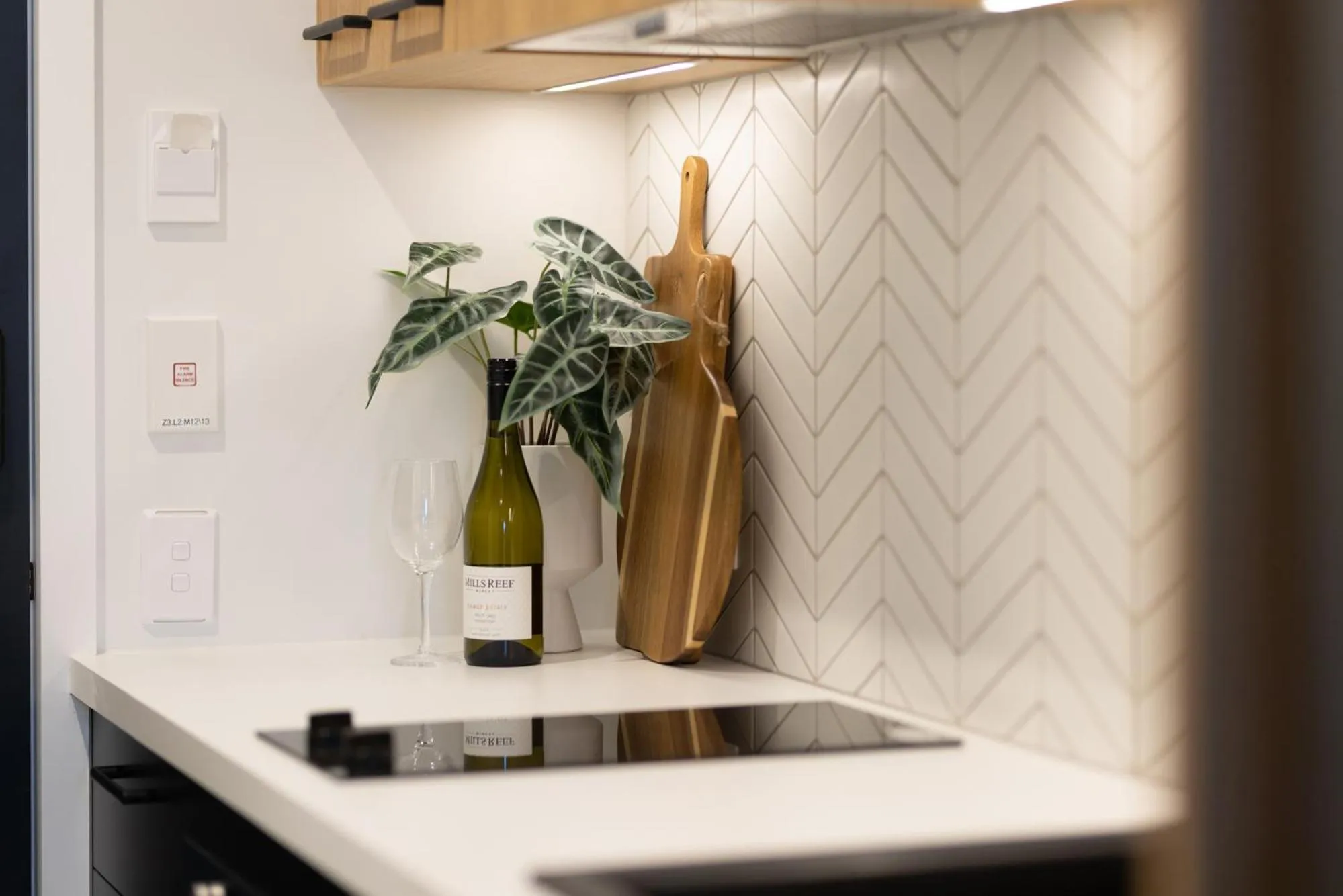 Kitchen or kitchenette in Quest Mt Maunganui