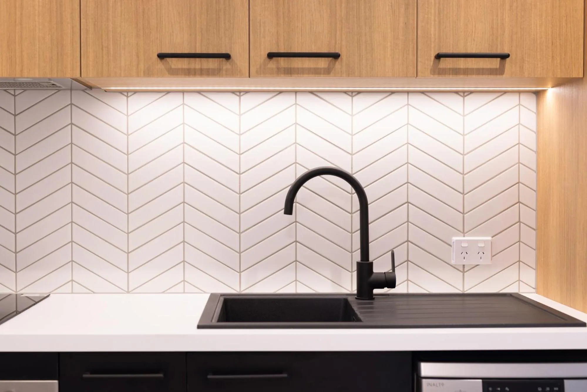 Kitchen or kitchenette in Quest Mt Maunganui