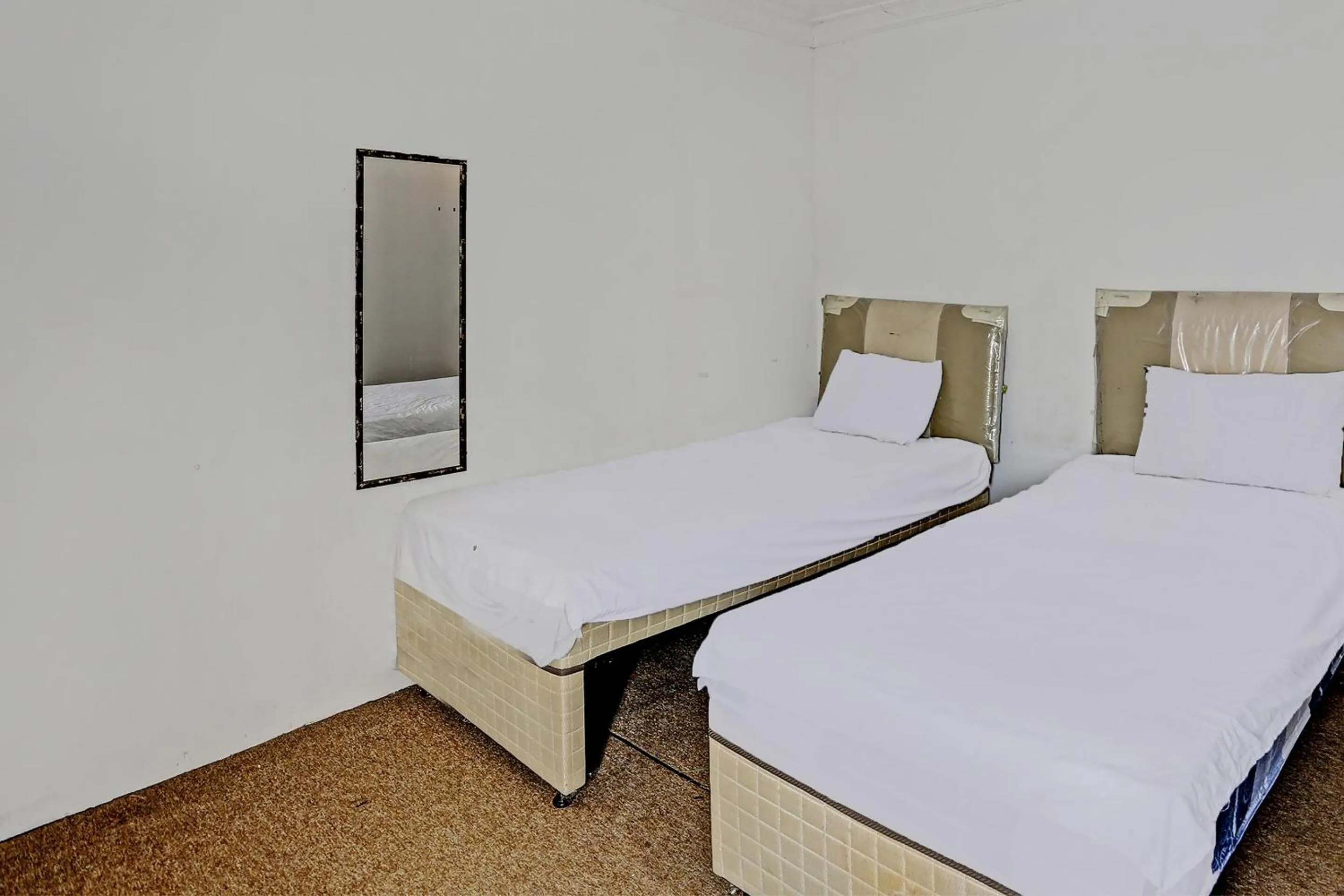 Bedroom, Bed in SPOT ON 92529 Penginapan Wisma Bintang Syariah Near MTs Al Ma'arif Kota Bangun