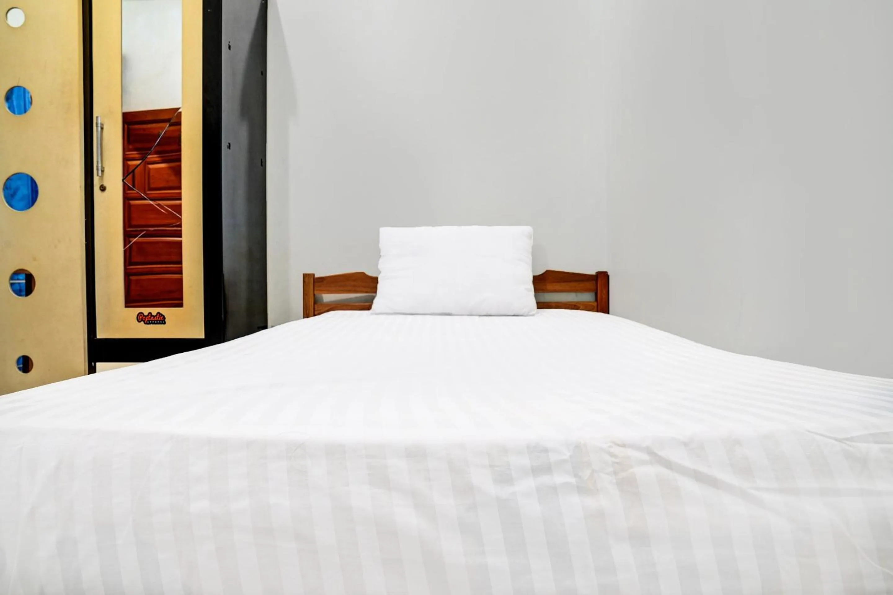 Bedroom in Hotel O Penginapan Hj Lilis Syariah