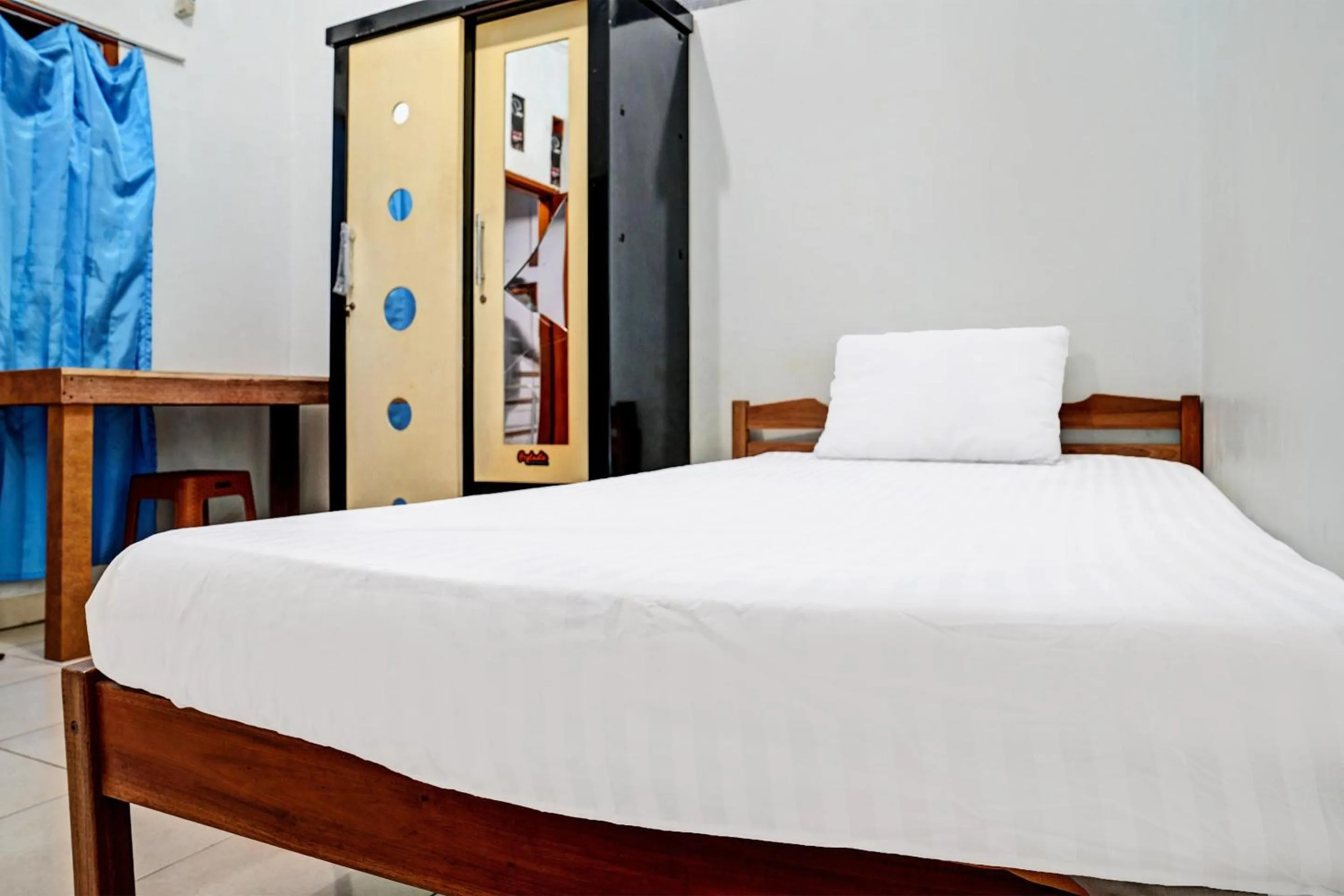 Bedroom in Hotel O Penginapan Hj Lilis Syariah