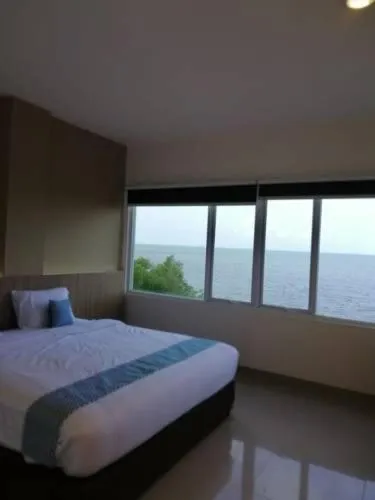 Bed in The Holiday Guest House