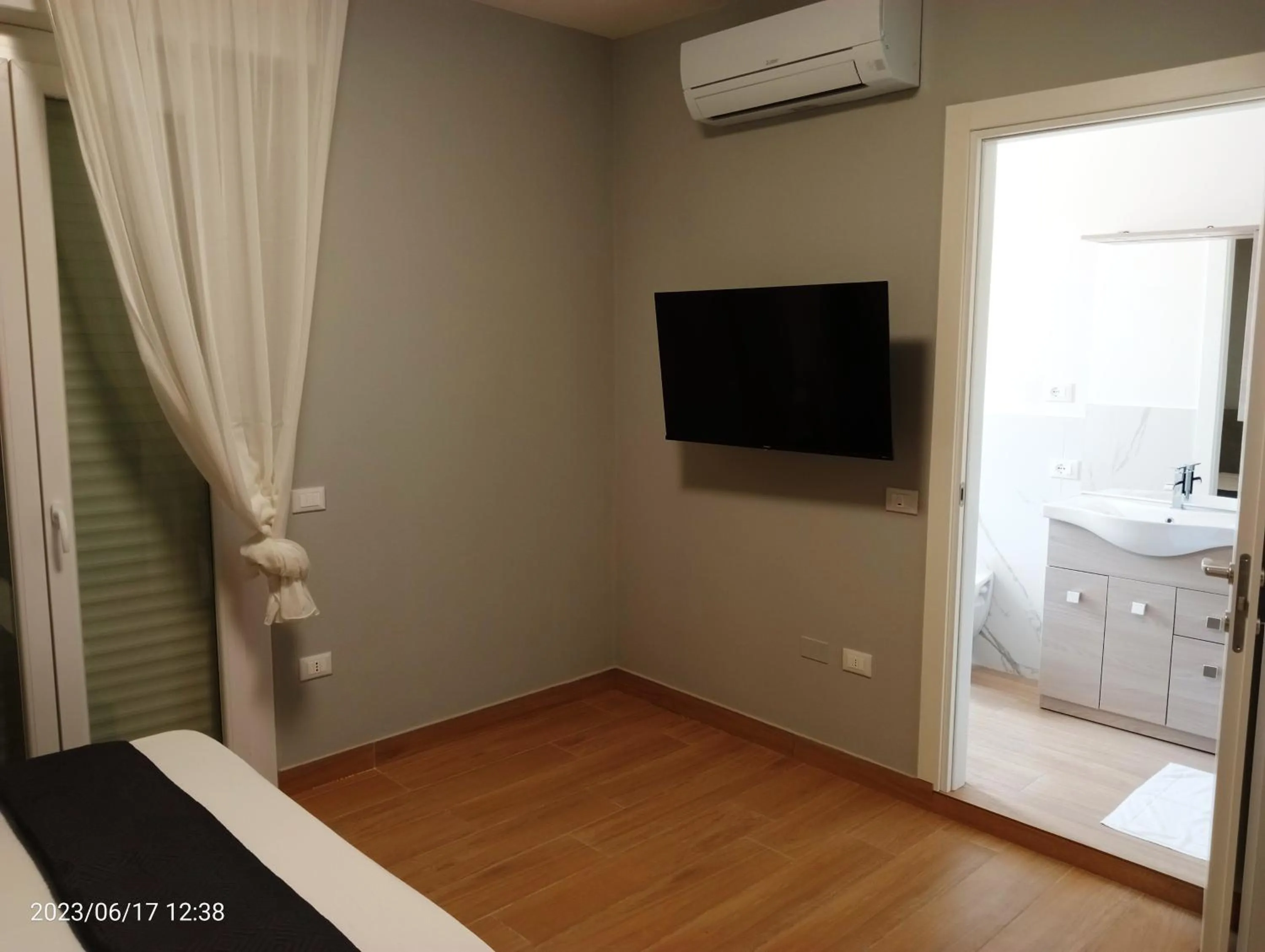 Communal lounge/ TV room, Bed in Residenza delle Nazioni