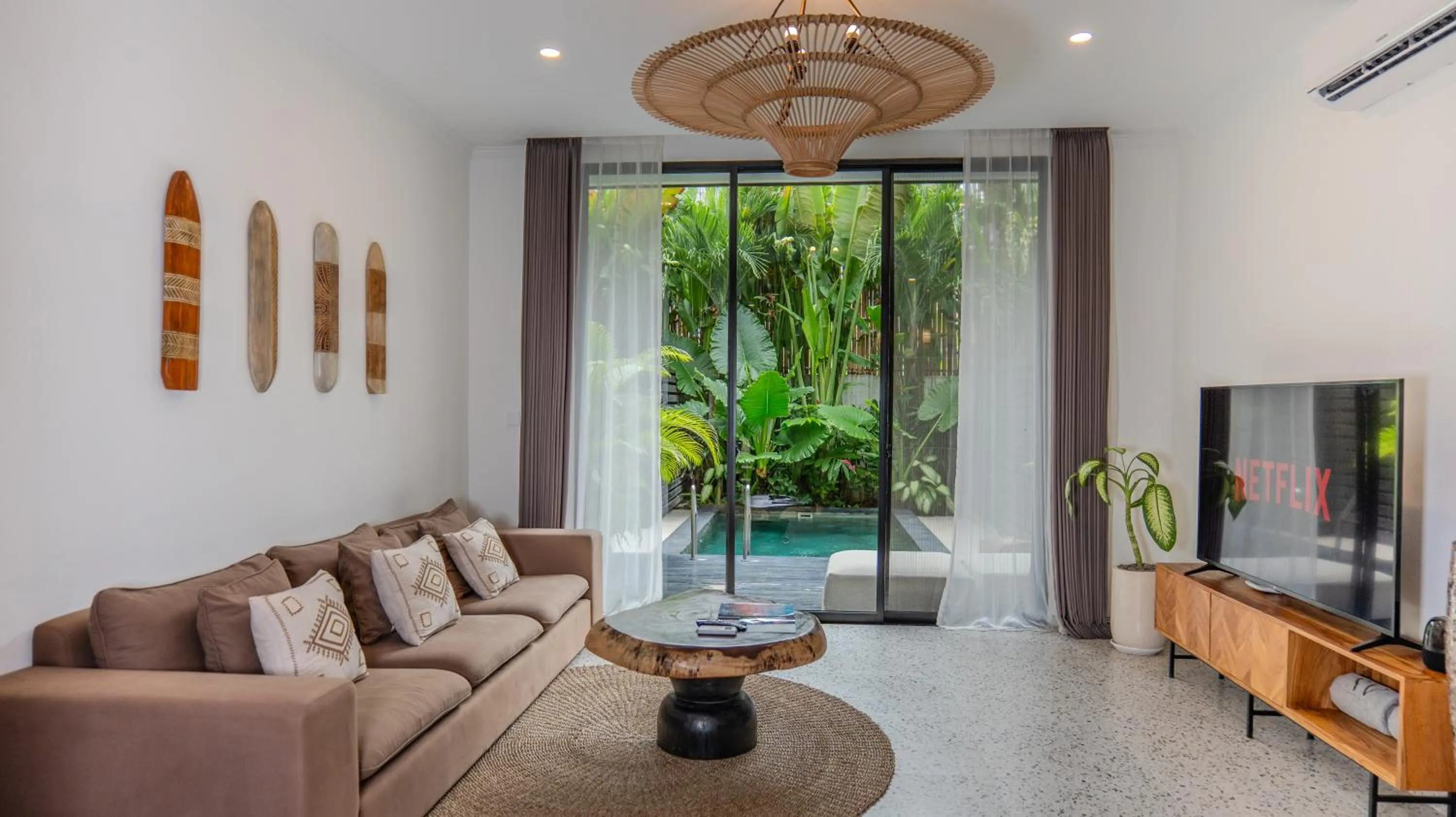 Communal lounge/ TV room in Sunny Village Batu Bolong