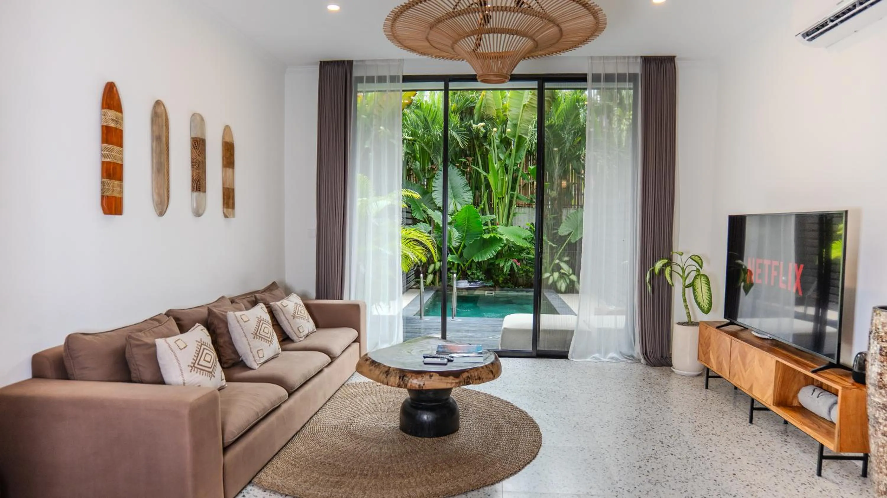 Communal lounge/ TV room in Sunny Village Batu Bolong