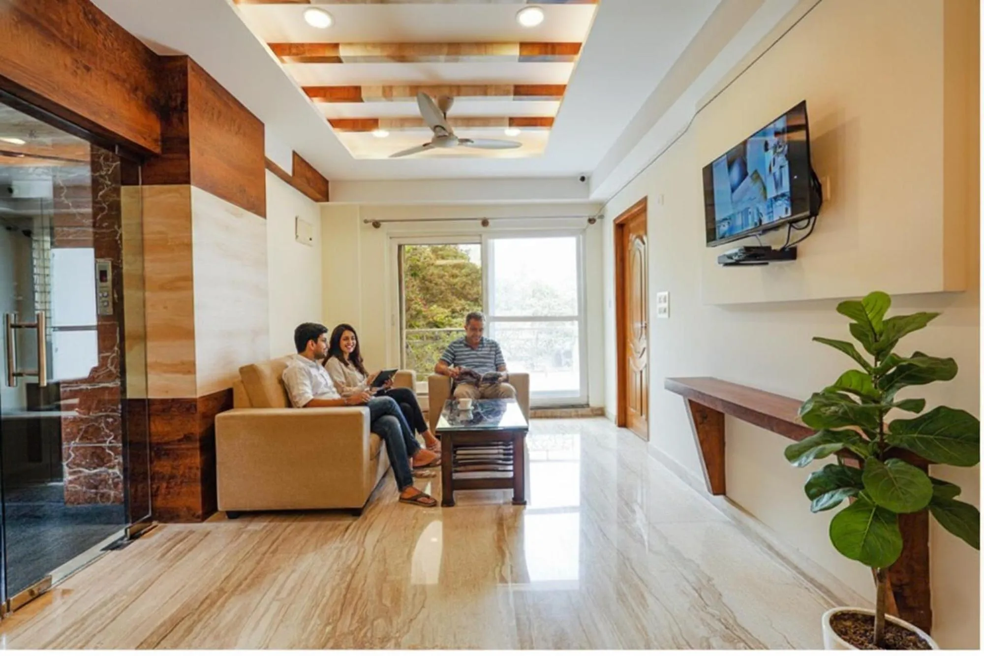 Seating area in FabHotel Shakthi Suites - Nr Jayadeva Hospital