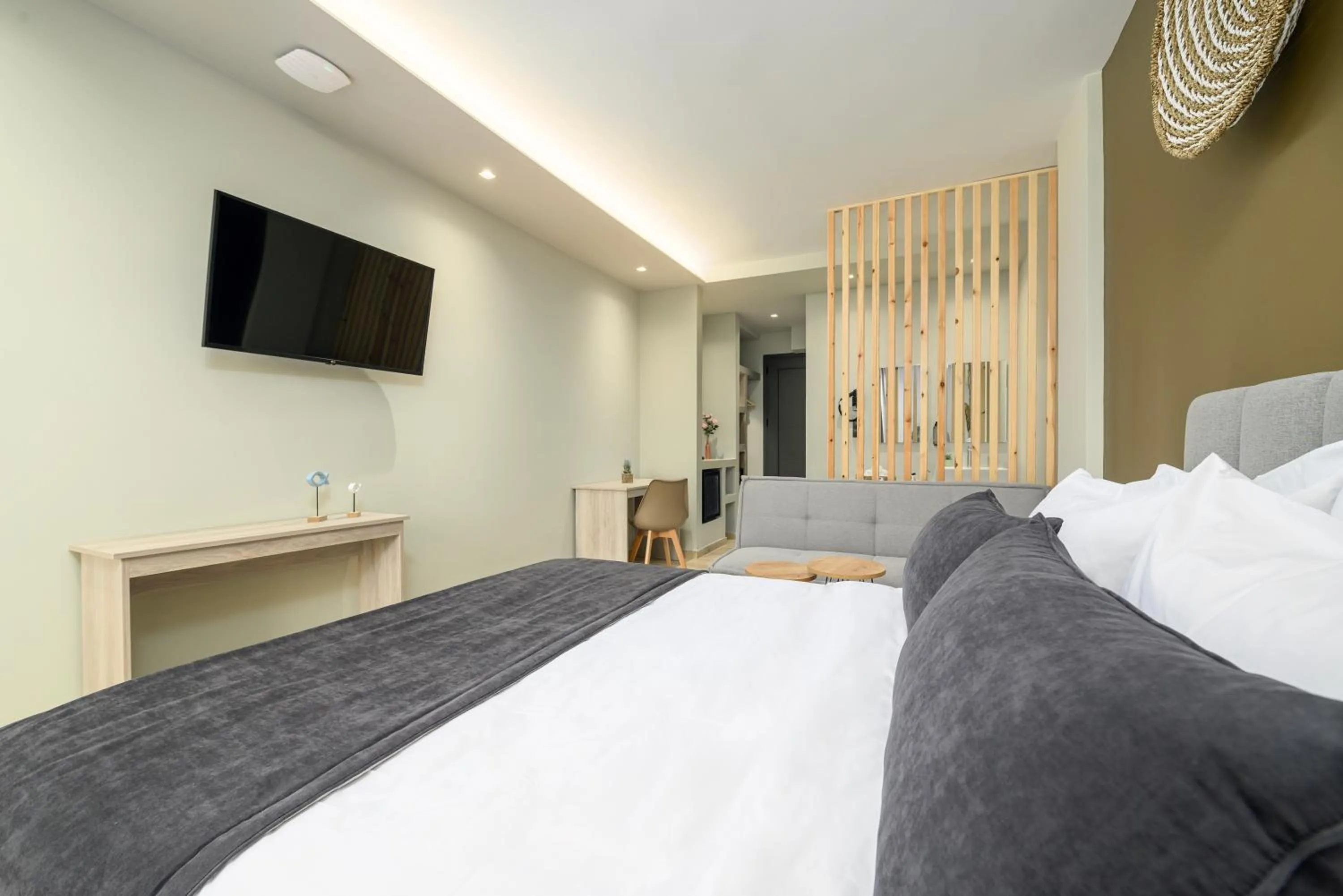 Bed in Nicolas Grand Suites, Adults Only