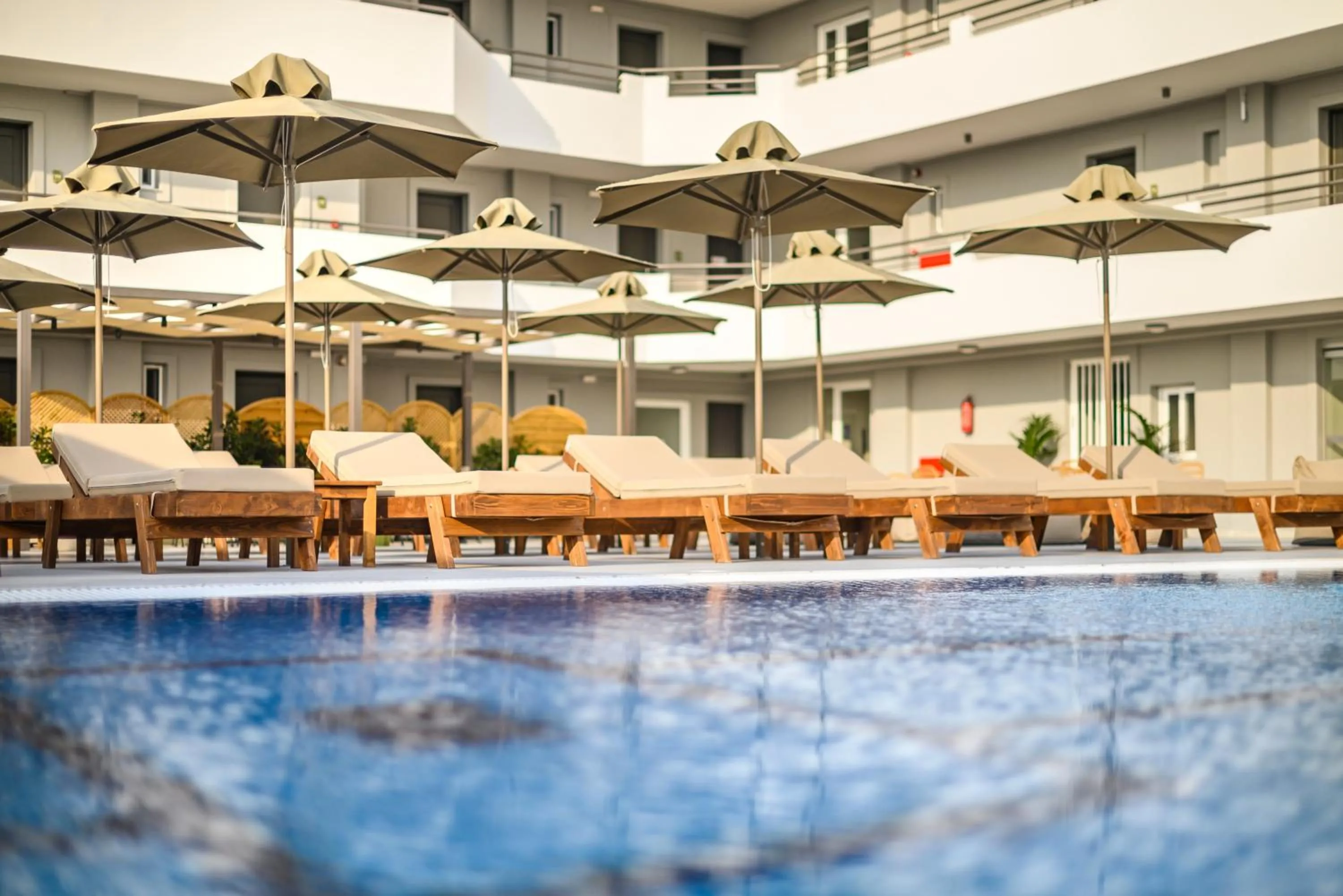 Swimming pool in Nicolas Grand Suites, Adults Only