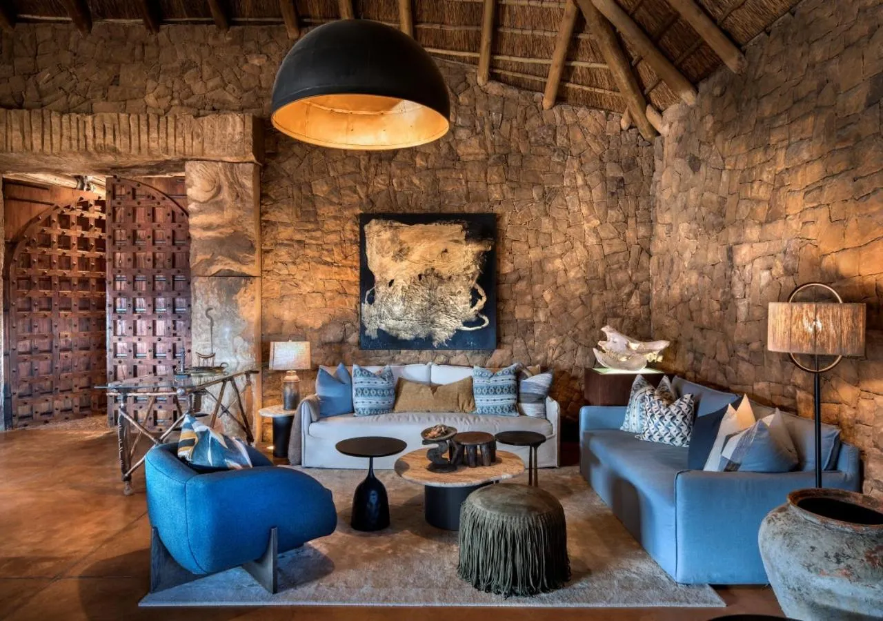 Seating area in Babohi at Qwabi Private Game Reserve by NEWMARK