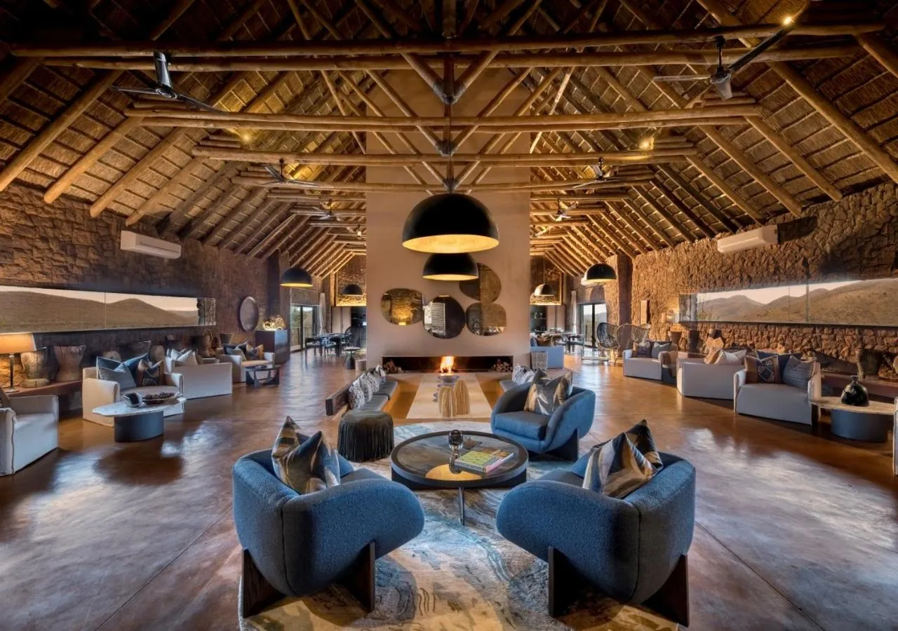 Lounge or bar in Babohi at Qwabi Private Game Reserve by NEWMARK