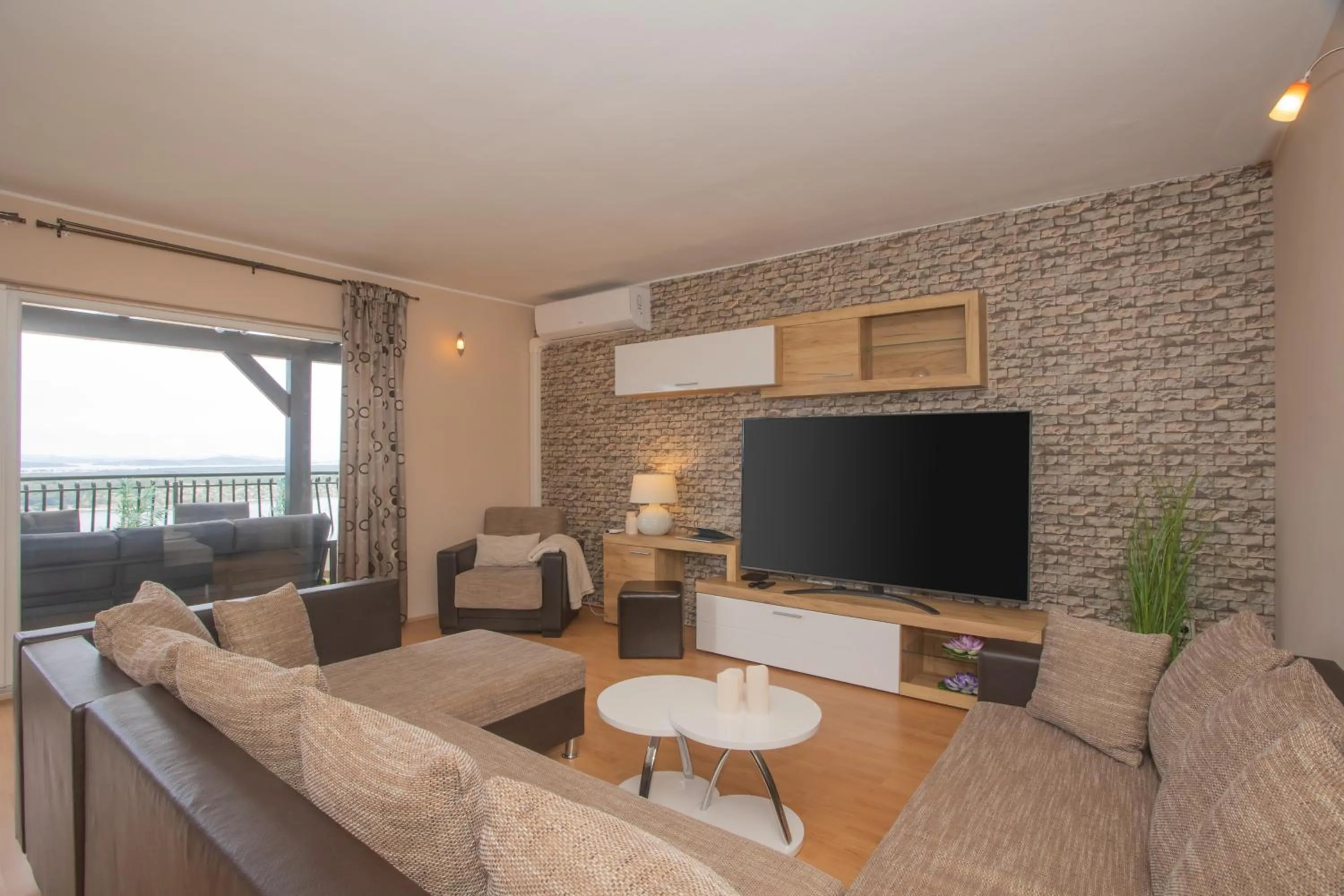 Communal lounge/ TV room in Apartment Mozart