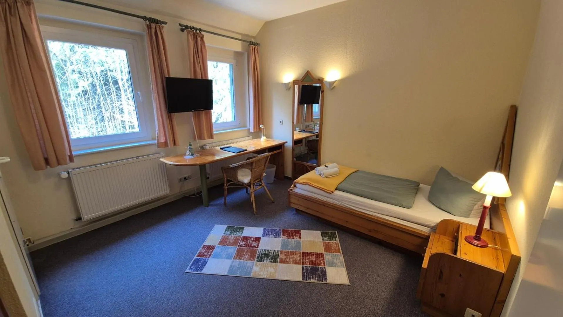 Photo of the whole room, Bed in Naturhotel Forsthaus