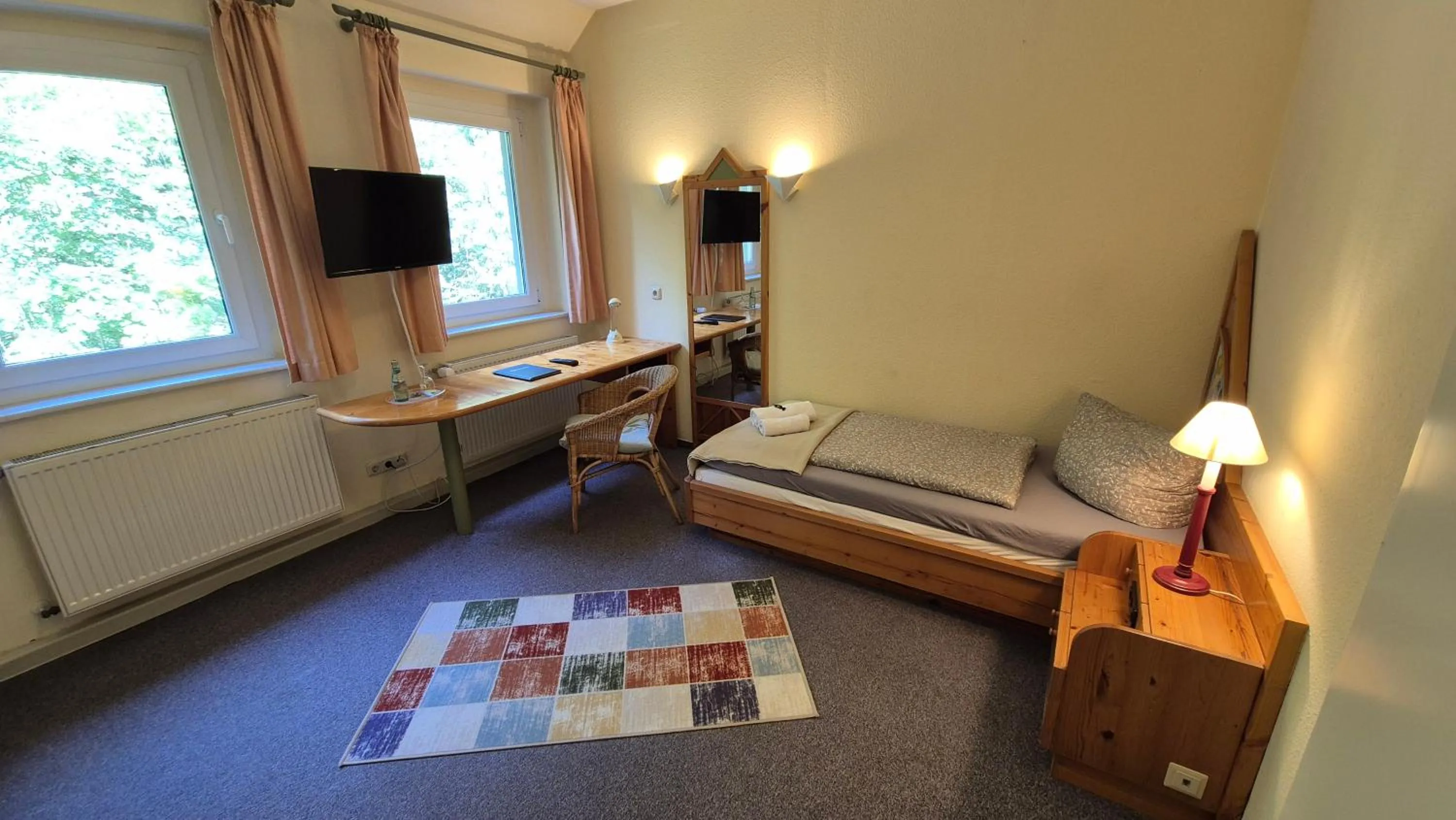 Photo of the whole room, Bed in Naturhotel Forsthaus