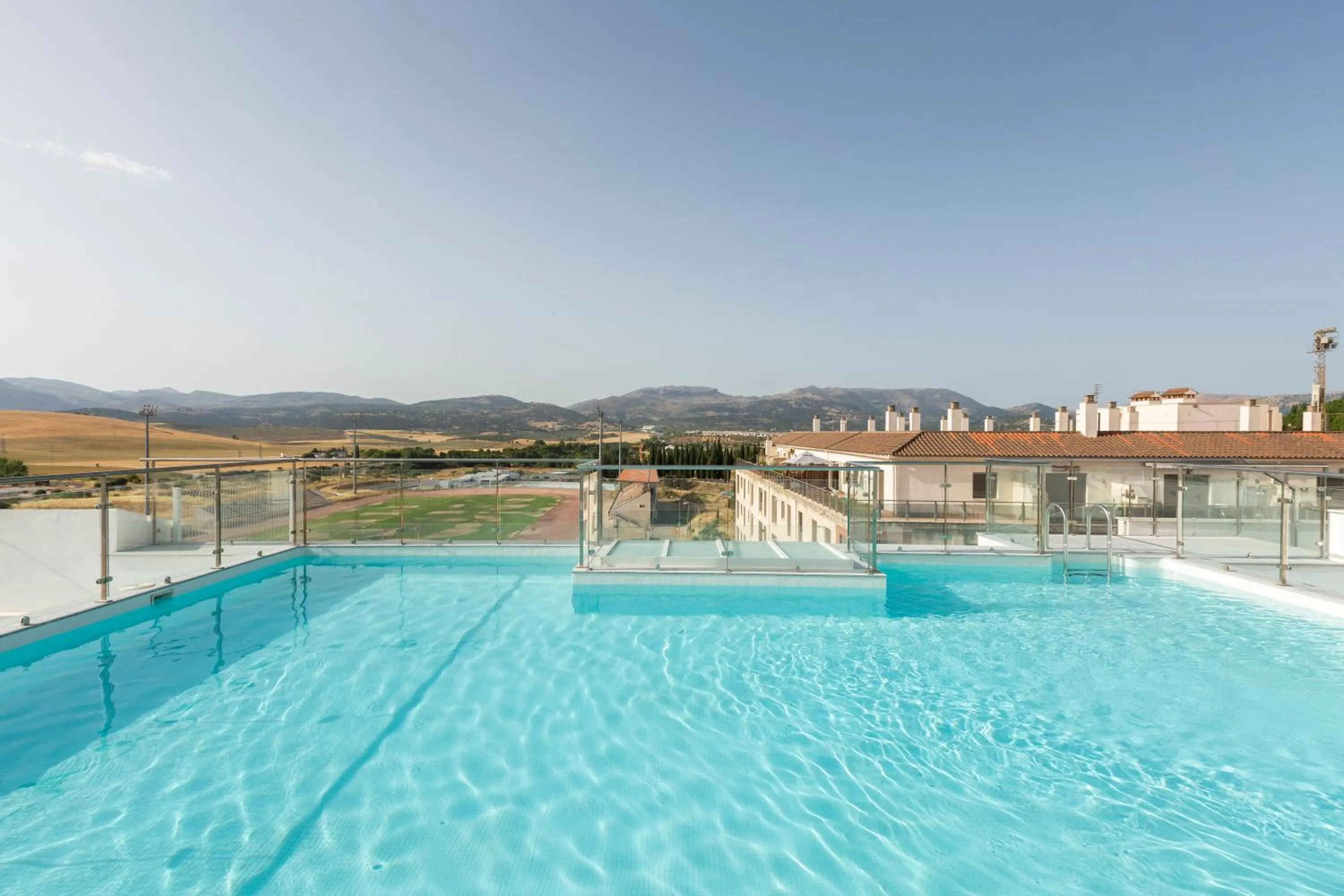 Swimming pool in Apartamentos Martalia Áticos Deluxe