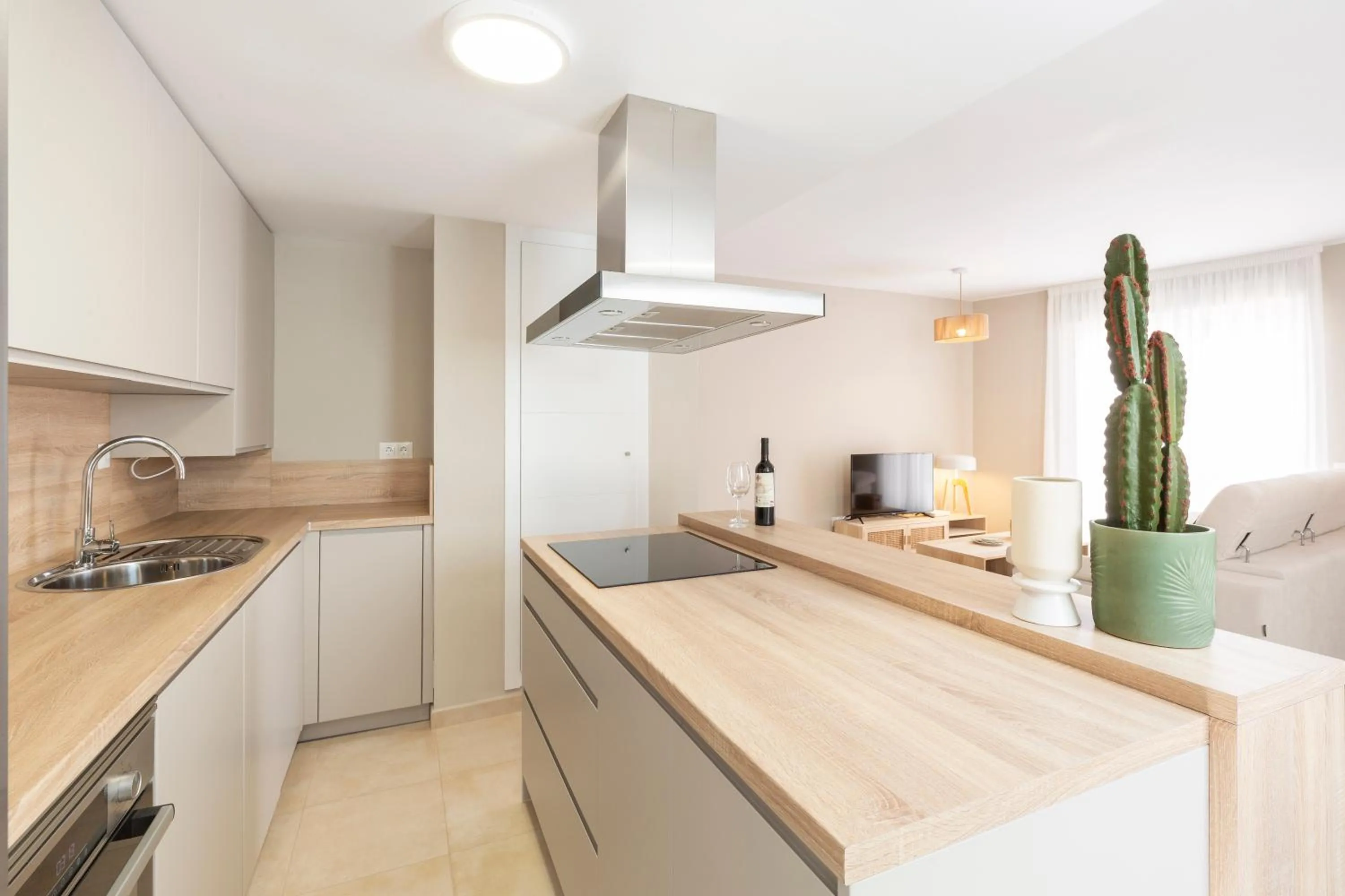 Kitchen or kitchenette in Apartamentos Martalia Áticos Deluxe