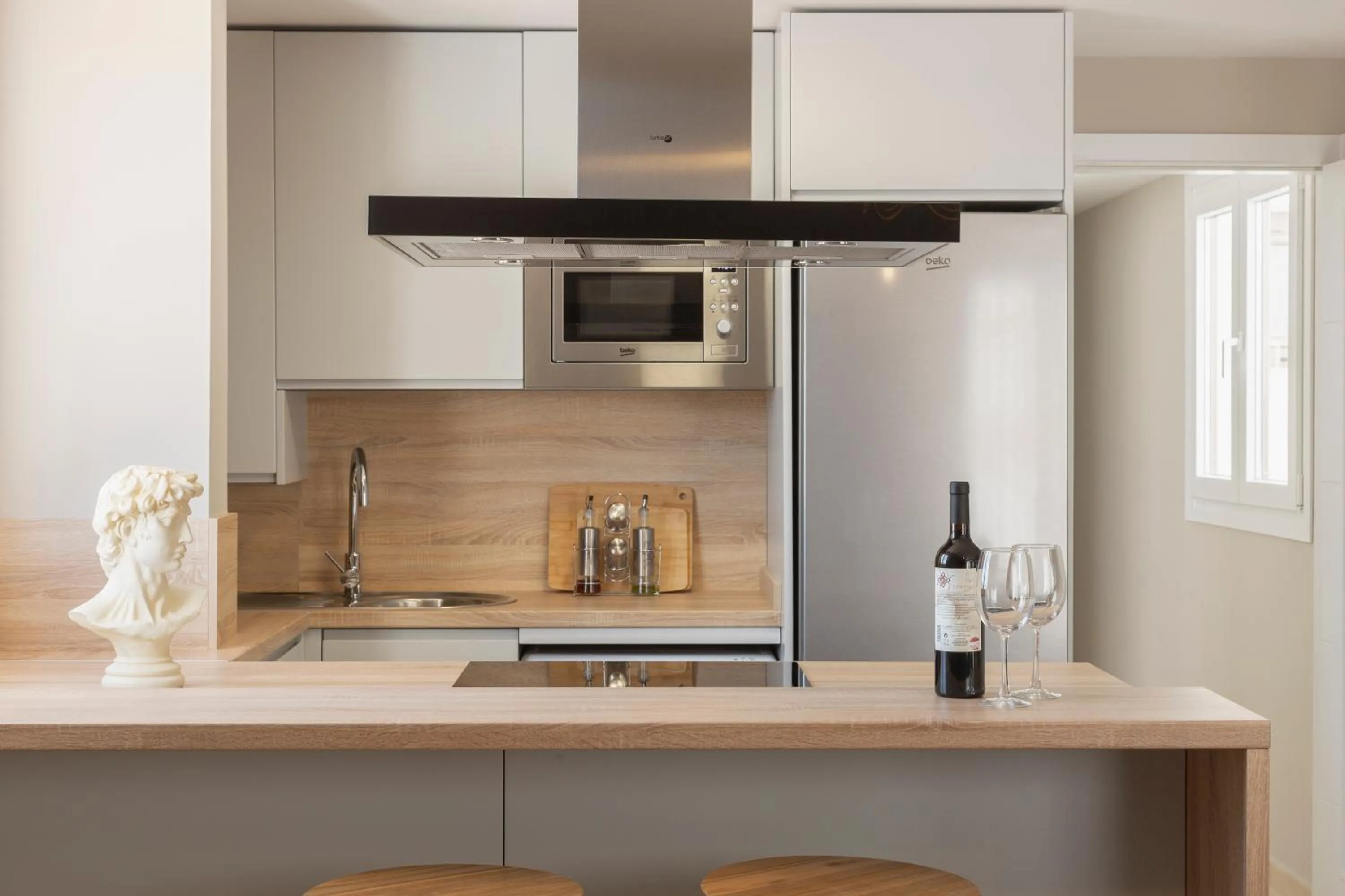 Kitchen or kitchenette in Apartamentos Martalia Áticos Deluxe