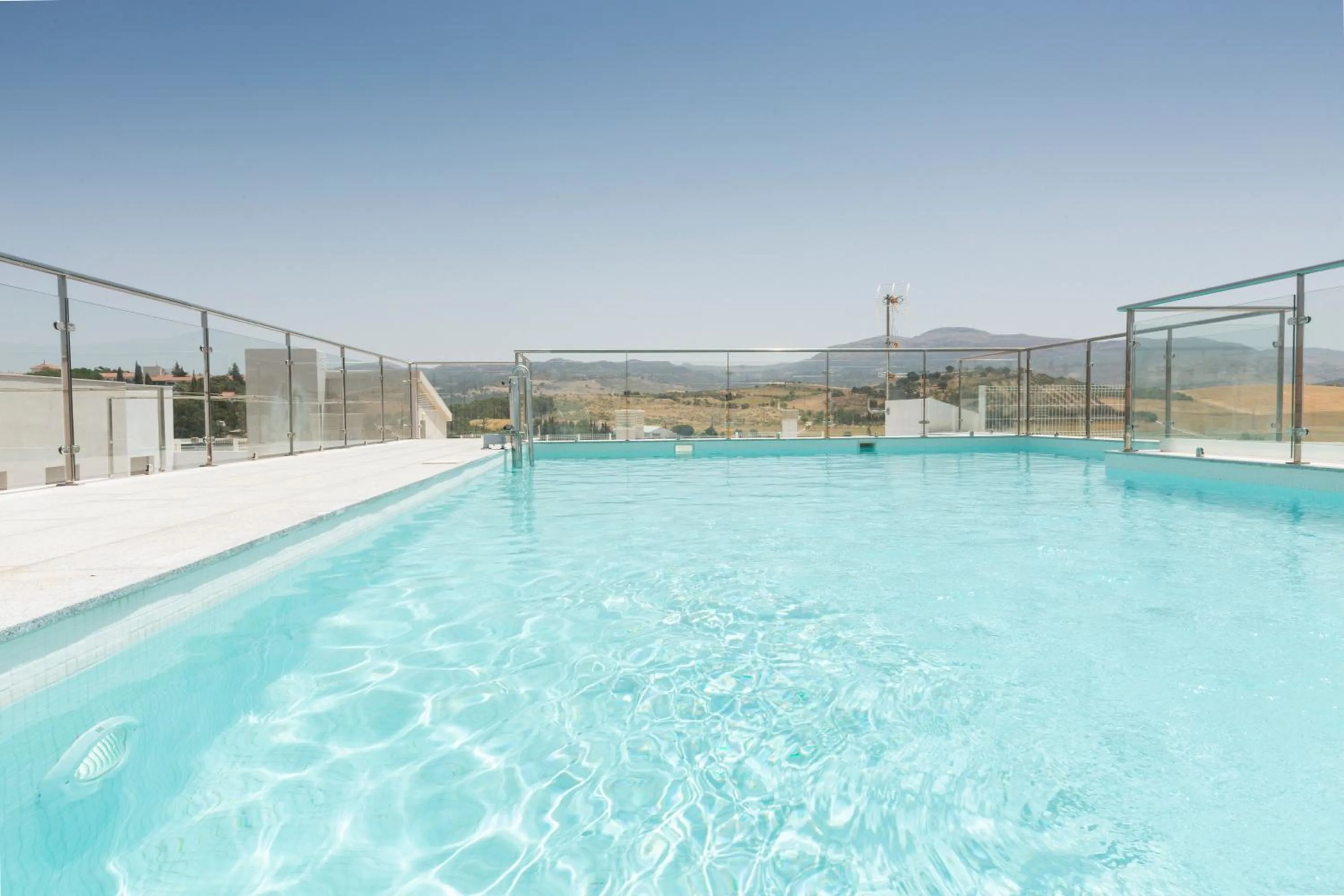 Swimming pool in Apartamentos Martalia Áticos Deluxe