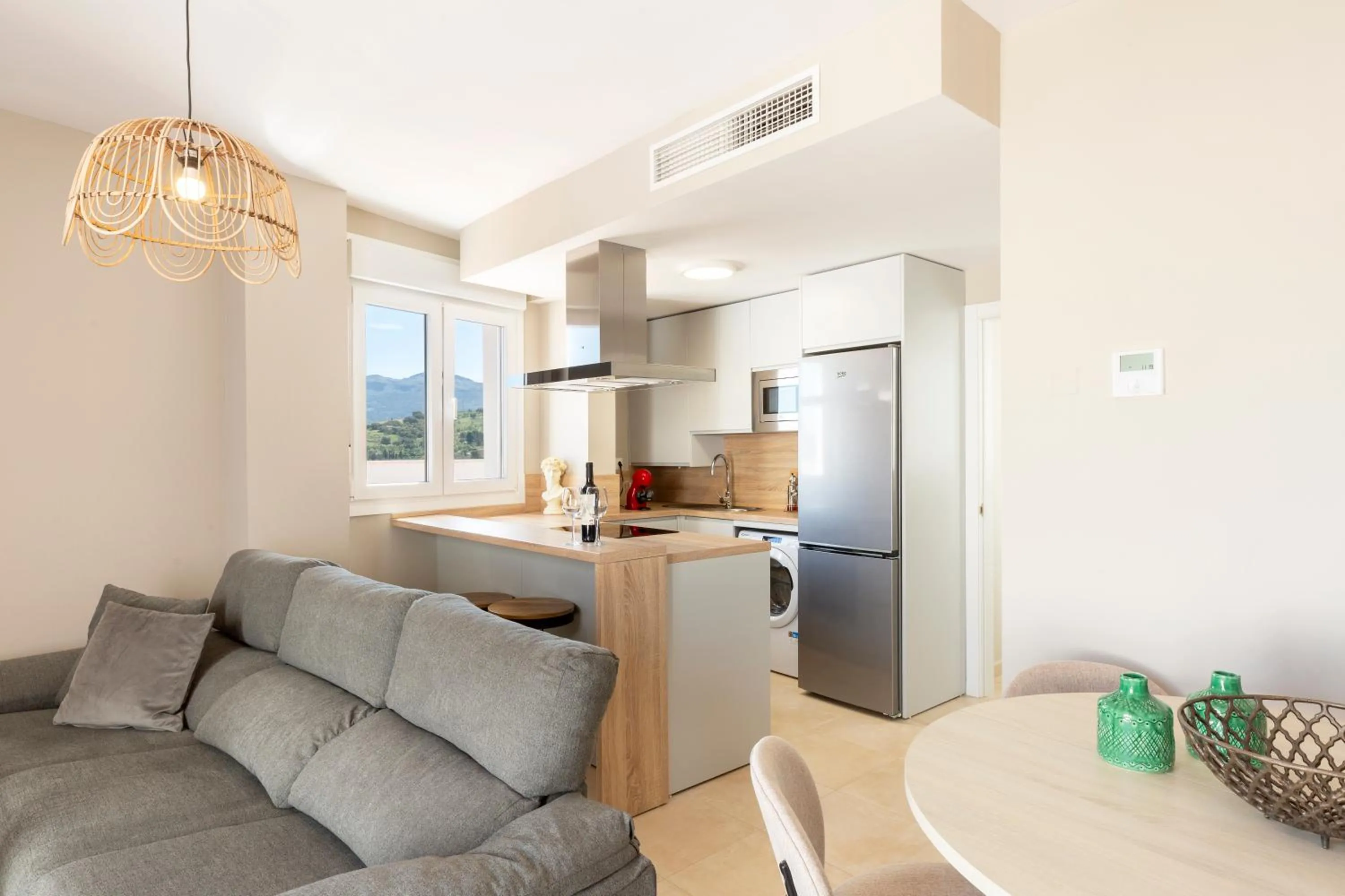 Kitchen or kitchenette in Apartamentos Martalia Áticos Deluxe