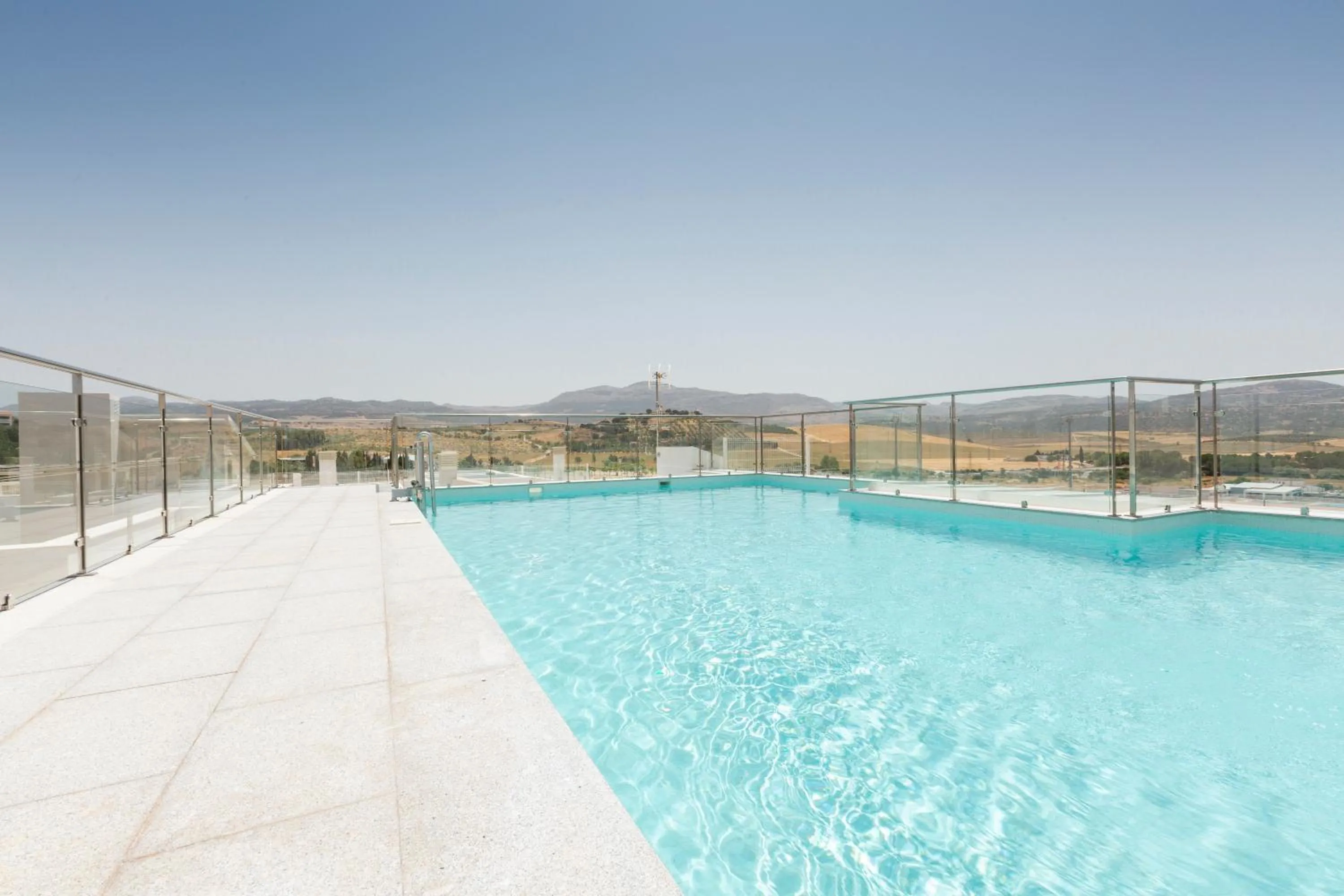 Swimming pool in Apartamentos Martalia Áticos Deluxe